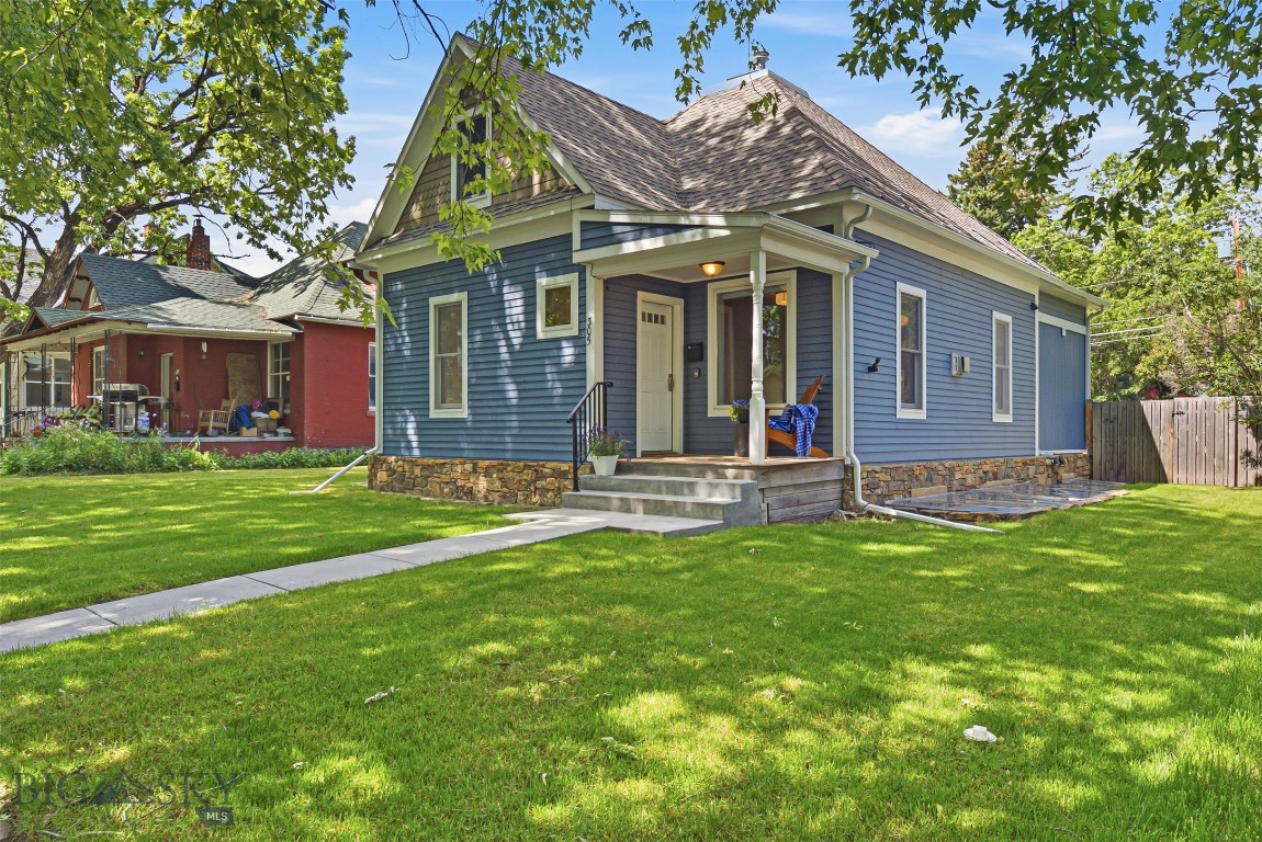 Full of character and timeless charm, this beautifully maintained and thoughtfully remodeled 1910 home is ideally located in the heart of Bozeman. Just moments from Copper Park, Southside Park, Montana State University, and Downtown Bozeman, you'll enjoy one of the city's most desirable and walkable locations. This inviting 4-bedroom, 2-bathroom home offers three levels of living space, including a spacious attic that makes an ideal playroom, office, creative studio, or bonus room. Freshly painted and exceptionally well cared for, the home blends historic charm with modern comfort. The cozy living room fireplace creates a warm gathering space, while abundant natural light enhances the home's welcoming feel throughout. Outside, mature trees frame the charming front porch—an ideal spot to enjoy your morning coffee or relax at the end of the day. The fenced backyard is quiet and private, featuring established planter beds, a small deck perfect for entertaining, and beautiful afternoon sunshine. A gated rear entrance provides convenient off-street parking for two vehicles. Clean, comfortable, and full of personality, this special property offers the rare combination of character, functionality, and an unbeatable location close to everything Bozeman has to offer. The home was removed from foundation and a 9ft basement was added along with updating all the electrical, plumbing, newer roof, boiler, windows in 2015. ADORABLE PROPERTY!!