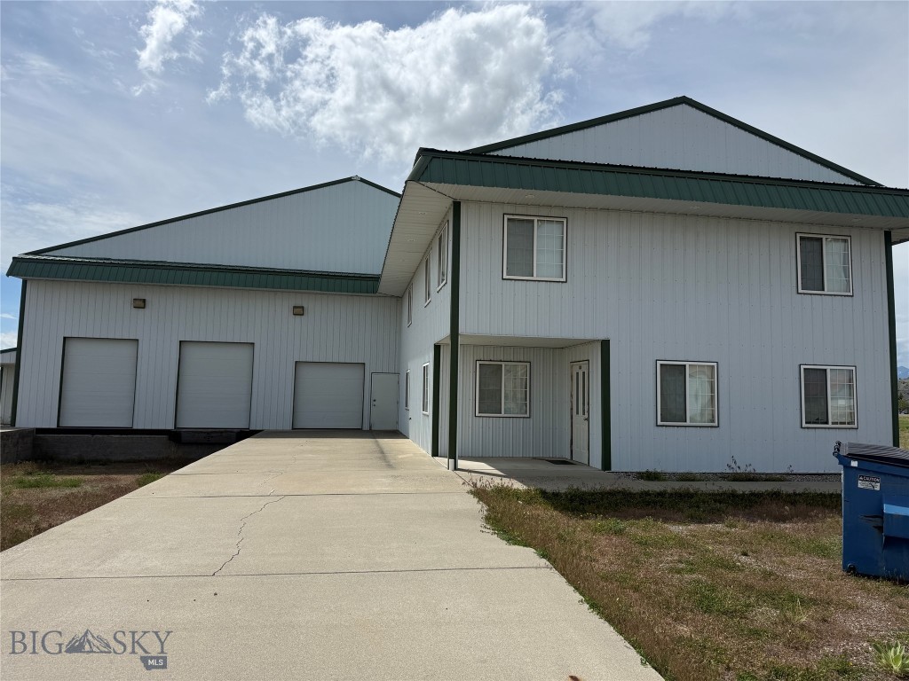 Position your business for success with this exceptional commercial and industrial property in Big Timber's desirable Centennial Park Subdivision. Big Timber is a thriving western town and conveniently located along the Interstate 90 corridor between Bozeman and Billings. This versatile property offers outstanding access, infrastructure, and room for future growth.  Built in 1995 with quality commercial construction, the property features 14,760 square feet of space, including approximately 11,464 SF of warehouse/manufacturing area and 3,294 SF of office space across two levels. The flexible layout is well suited for manufacturing, warehousing, distribution, agricultural services, contractor operations, and a variety of other commercial uses.  The property is fully serviced with electricity, natural gas, city water and sewer, and is zoned Manufacturing and Industrial, allowing for numerous permitted and conditional uses. Situated on a 2.986 acre site, the offering includes a 1.493 acre lot with the building along with an adjacent 1.493 acre vacant lot, providing valuable expansion potential for future development or additional storage and parking. Designed with logistics in mind, the building offers convenient truck access and shipping capabilities with multiple overhead/loading doors and ample space for receiving and distribution operations.  Whether you are expanding an existing operation, relocating your business, or investing in Montana commercial real estate, this highly adaptable property offers the infrastructure, location, and flexibility to meet a wide range of business needs.  A rare opportunity to own a turnkey commercial/industrial facility in one of south-central Montana's growing business corridors.