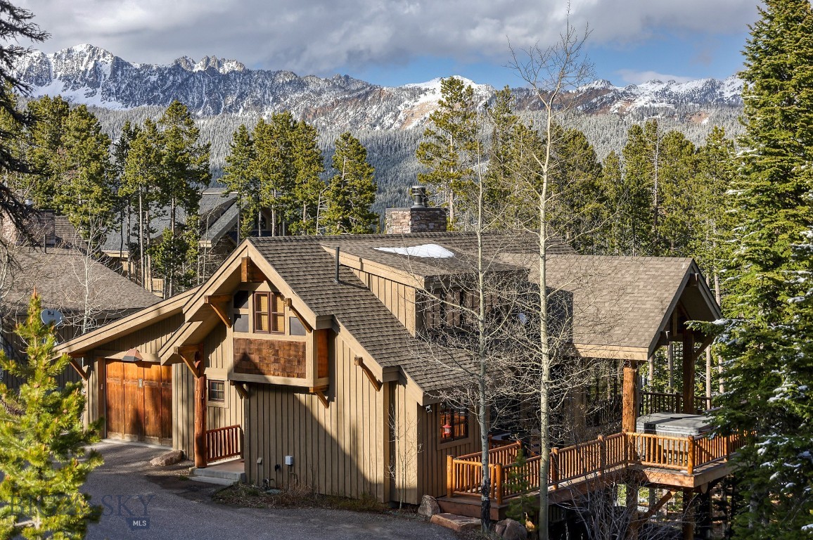 Experience the ultimate mountain lifestyle in this exceptional 4 bedroom, 4 bath ski-in, ski-out residence in Moonlight Basin. The home is offered fully furnished with high quality furniture and includes a new Trex deck. It has panoramic views and most importantly offers direct access out the back door to some of the finest skiing in the Rockies while providing a private sanctuary to enjoy year-round.
Thoughtfully designed with spacious gathering areas, expansive windows, and warm mountain-inspired finishes, the home seamlessly blends comfort and elegance. After a day on the slopes, unwind in the private outdoor hot tub while taking in breathtaking views of the surrounding peaks and endless Montana sky.
Whether hosting family and friends or enjoying a quiet mountain escape, this remarkable home offers the ideal combination of luxury, convenience, and adventure. With unparalleled ski access, stunning vistas, and the privacy of a standalone residence, this is mountain living at its finest.