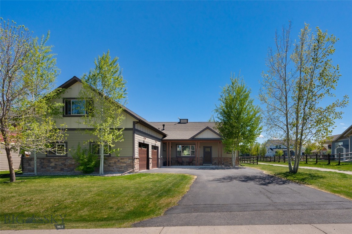 Welcome to this truly remarkable home in Middle Creek Parklands, with an easy to love floor plan and premium upgrades throughout. The main level features an open concept living, dining and kitchen area complete with soaring ceilings, large eat-in island granite countertops, newer Bosch appliances, under cabinet lighting and a gas fireplace. The primary suite includes a large walk-in closet, soaking tub and tiled shower with three shower heads. Enjoy your own separate bar area or use it as a built in office nook, two additional bedrooms, a full guest bathroom with dual vanities, half bathroom, laundry room and a great big mudroom off of the oversized two car attached garage with workshop space. Upstairs is a large fourth bedroom or bonus room, with a walk-in closet and full bathroom, offering a wide range of uses. Additional home upgrades include window coverings, central AC, radon mitigation and surround sound. Bordered by community trails and open space on two sides, the lot is just over a quarter of an acre, with a covered back porch, underground sprinklers, perimeter fencing and coveted Bridger Mountain Views. Middle Creek Parklands is perfectly situated between Bozeman and Four Corners, with easy access to town amenities and Montana recreation. This home is not to be missed and one lucky Buyer will make this their new HOME SWEET MONTANA HOME.