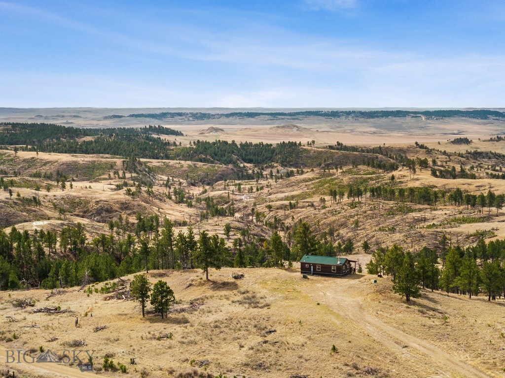 This 160-acre property in Montana’s highly regarded 410 district offers exceptional hunting opportunities in a landscape known for its game density and rugged character. While the landowner preference is focused on deer and antelope, the property consistently holds a strong population of elk, giving hunters a well-rounded and highly versatile experience.

Elk are plentiful throughout the area, regularly moving through the natural draws and broken terrain that define this parcel. For those pursuing elk, the odds of drawing an archery tag in this district are favorable, making it an attractive option for hunters looking to capitalize on both opportunity and accessibility.

Situated near the iconic Charles M. Russell National Wildlife Refuge, the property embodies the raw beauty of eastern Montana. Deep coulees, rolling prairie, and rugged breaks create ideal habitat for wildlife while offering a challenging and rewarding hunt.

Adding to its appeal, the property is located just 16 miles from Fort Peck Lake, known for outstanding fishing and additional hunting opportunities. The area is further complemented by access to approximately 35,000 acres of nearby BLM land, expanding your range and enhancing the overall recreational value.

A comfortable & fully furnished cabin on the property is equipped with electricity and two RV hookups, providing a convenient basecamp for extended stays while enjoying everything this property and surrounding area have to offer.

Whether your focus is mule deer, antelope, or taking advantage of the abundant elk presence, this property delivers the authentic experience of Montana’s wild, untamed landscape.