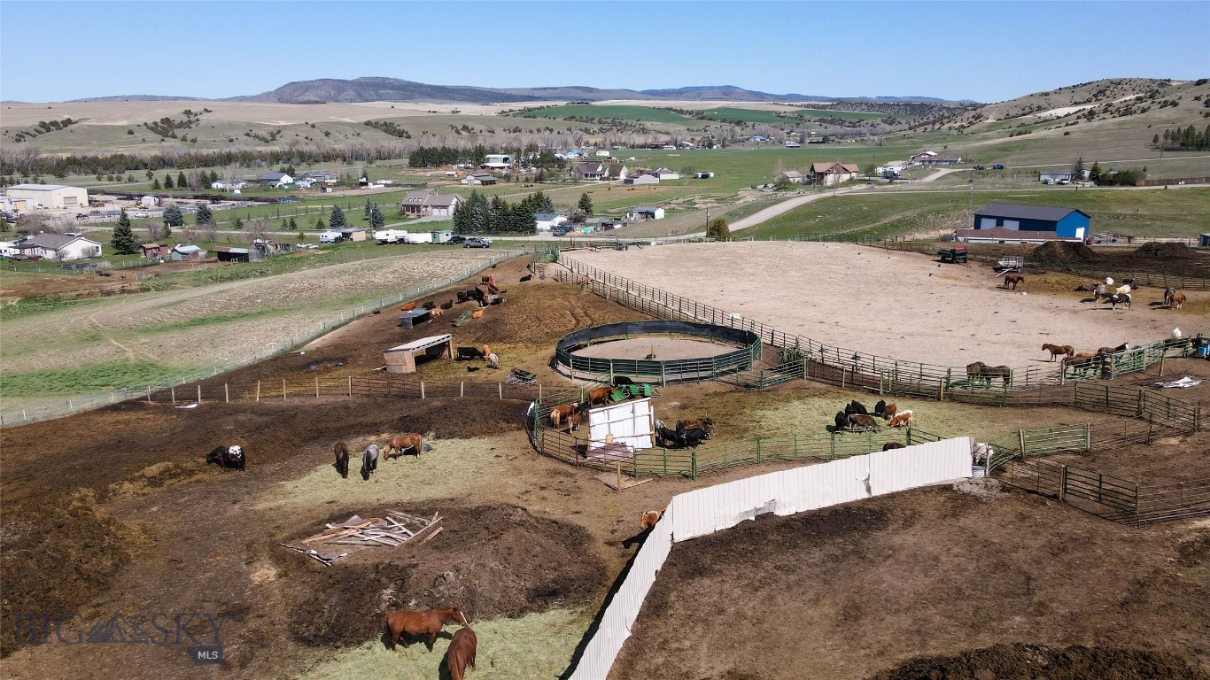 Complete Working farm in Belgrade – Income Producing with No Known Covenants! This impressive property offers everything you need for a thriving ranching operation, including two houses, extensive livestock facilities, and income-producing potential. Whether you're looking for a full-time residence or a recreational getaway, this ranch is ready to go. Main house is 1900 sq ft 3 bed 2 bath, 2nd house is 2 bed 1.5 bath. 2 separate septics Property is ready for livestock, Barn with electric heat- 4 stalls, heated graining room amd tack room, 6 grass pasture lots with shelters, 3 dry lots with wind breaks, roping cattle pen, 5 additional paddocks, 2 goat pens with automatic waters, ALL pens have automatic waterers-8 total. Approximately 6 acres irrigated, ALL pipe fencing, and panels, HUGE outdoor roping arena, round pen, extra lot for farming equipment/trailers. 2 hay sheds, Heated shop, RV hook ups, 2 wells on the property and much much more. 8 Mi To Belgrade, 8 Mi To Manhattan, 20 Mi To Downtown Bozeman. 10 Min To The Bozeman Airport, 20 Min To Bridger Skiing. Current Operation-JR Performance Horses.