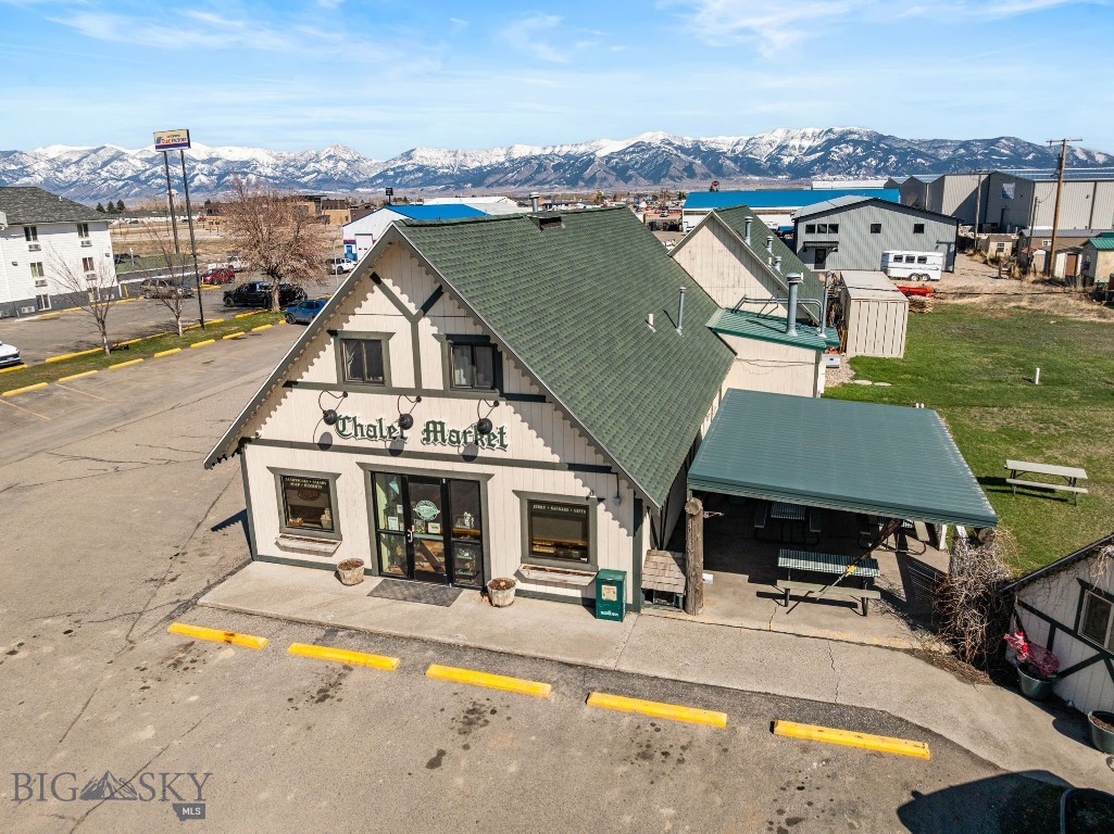 Don’t miss this opportunity to own the legendary Chalet Market! Its real estate site & facilities have a prominent location on Jackrabbit Lane adjacent to the I-90 Exit 298 providing great visibility and ease of access to Belgrade’s growing commercial corridor. Chalet Market was established in the 1970s and has maintained a consistent growth journey for 50 years. It remains popular among local patrons as well as travelers who frequent the greater Gallatin Valley. You will find its signature meats including cured & smoked sausages, snack stix, and elk or buffalo jerky in its deli and gift shop as well as retail outlets throughout Montana, Wyoming, and shipped around the world in their gourmet gift boxes. Chalet Market has a multi-faceted business model - with deli & catering; Made in Montana gift shop featuring meats, cheeses, beer, wine, jams, & sauces; USDA manufacturing & meat processing plant; and its wholesale distribution and robust online retail business. Chalet Market’s Made in Montana gift shop was honored as Retailer of the Year in 2018 by the Montana Department of Commerce, and it was recognized as a Featured Business in Google’s 2023 Economic Impact Report, highlighting Chalet Market’s internet sales that increased 20 percent from 2021 to 2022. The property and business are within the City of Belgrade, connected to city water, and operate on its own septic system. With the guidance of the current owners who have been at the helm of this company for the past 13 years, this exciting opportunity is well positioned for an entrepreneur seeking to acquire an established business in Southwest Montana. This thriving enterprise has a proven track record, consistent profitability, and significant revenue growth potential. All FF&E included (furnishings, fixtures, & equipment). New owners can launch with immediate cash flow, turnkey operation, existing customer base, and excellent facility location.  Current owners are committed to a smooth transition and will assist new owner with training to set them up for success to continue this legacy business. The location is stellar, the brand is solid, the products are delicious. Launch your entrepreneurial future as the next generation of Chalet Market!