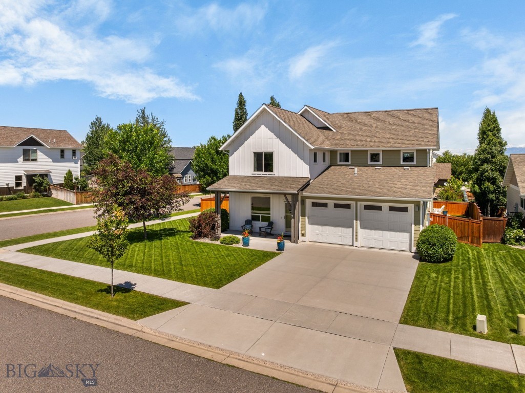 Experience the best of Bozeman living in this perfectly maintained, single-owner home in Woodland Park. The inviting main level features an open-concept layout centered around the heart of the home: the kitchen. Large windows offer abundant natural light, and the gas fireplace in the living room provides a cozy place to recharge. Upstairs, you