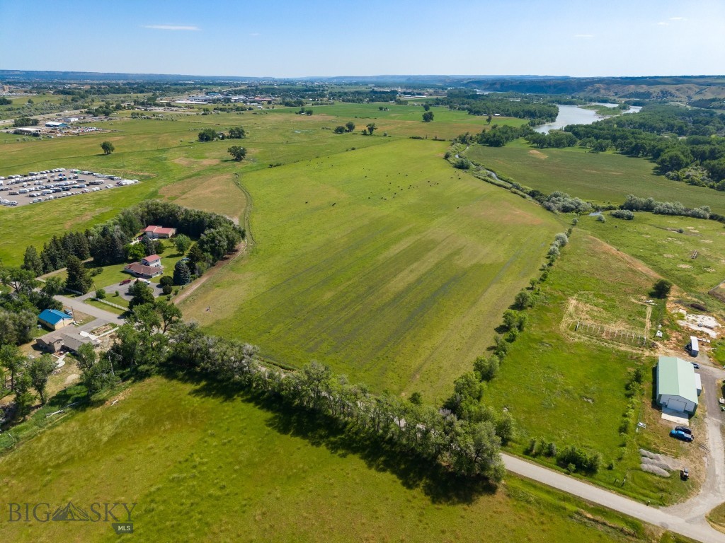 This 70.45± acre property offers a rare opportunity for developers seeking a strategic location with unmatched potential. Situated just south of Billings—Montana’s largest city and economic hub—this parcel is currently classified as Agricultural, offering great potential flexibility for future zoning and development, whether commercial, residential, or mixed-use. With exceptional access to I-90, close proximity to the Yellowstone River, and picturesque landscapes, this potential developable acreage provides incredible value.