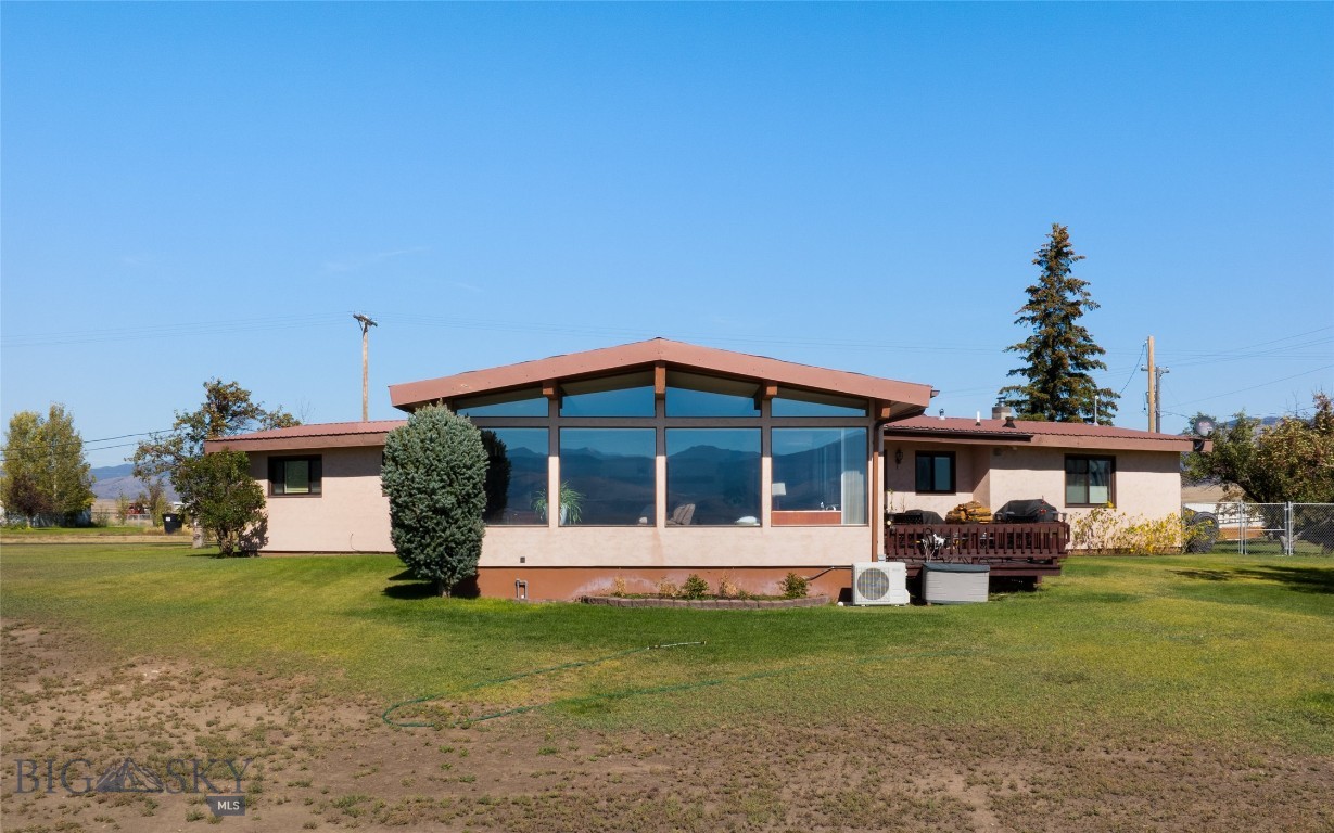 This stunning hilltop home truly has it all — sitting on 2.17 acres, it offers 3 spacious bedrooms, 3 full bathrooms, and a layout designed for both comfort and functionality. Step into a large open kitchen perfect for entertaining, which flows seamlessly into a sunken living room with a grand wood-burning fireplace — ideal for cozy evenings. 
Take in breathtaking mountain views from the expansive deck, creating the perfect setting for outdoor relaxation or entertaining.
Additional highlights include:
Bonus/Laundry room with a Murphy bed, ideal as a 3rd bedroom, guest space, home office, or den — complete with an updated bath featuring heated floors.
Primary suite with a luxurious jetted whirlpool tub.
Updated appliances throughout.
Two A/C units for year-round comfort.
Metal roof for durability.
Underground Sprinkler system, raised bed garden and Large 2-car garage with extra storage space.  Fenced dog yard.
This home blends rustic charm with modern upgrades and spectacular natural beauty — the mountain views alone will make you fall in love.