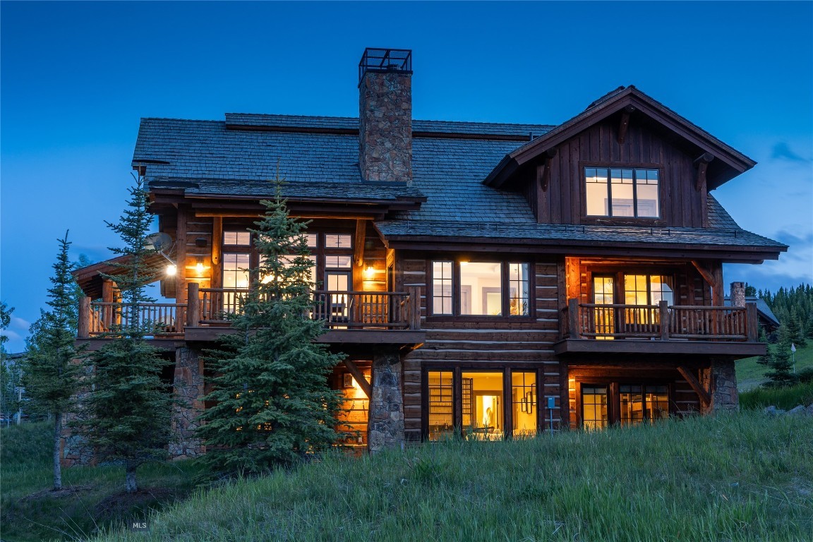 Nestled in the heart of Spanish Peaks Mountain Club, this Settlement Cabin delivers the ultimate mountain lifestyle ski-in/ski-out access connecting to Big Sky Resort at your door, steps from the clubhouse, the acclaimed Montage Hotel, and the renowned Tom Weiskopf signature golf course. Turnkey and beautifully furnished, it's ready for immediate enjoyment from the moment you arrive.

Six thoughtfully designed bedrooms accommodate every need: a generous primary suite, a comfortable junior suite, and a crowd-pleasing bunk room perfect for guests of all ages. Five-and-a-half bathrooms ensure effortless comfort throughout. Three distinct living areas offer flexible space for lively gatherings or quiet evenings around the fire, while the two-car garage adds everyday practicality.

Crisp, contemporary finishes blend seamlessly with the warmth of mountain materials, creating an interior that feels both refined and genuinely livable. This is a rare opportunity to own a world-class retreat in one of the region's most coveted communities. Whether used as a primary residence, seasonal escape, or income-producing investment, this cabin delivers on every front.