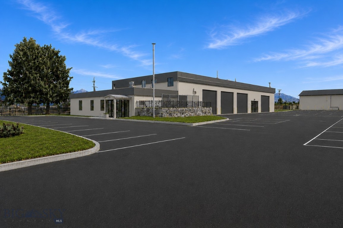 Unit 1 offers ±7,781 SF of warehouse and office space within a larger industrial building currently undergoing extensive reconstruction and upgrades following a 2024 fire; creating a rare opportunity to lease space in a revitalized, like-new facility. Located on 2.35 acres in Bruce Industrial Park with well and septic, natural gas, and heavy three-phase power, the property is ideal for a variety of industrial users. With close proximity to Interstate 90 and access to a large yard area, this space is well suited for warehousing, distribution, or manufacturing. Offered at $15/SF NNN. Ample on-site space supports efficient truck circulation and outdoor storage needs.