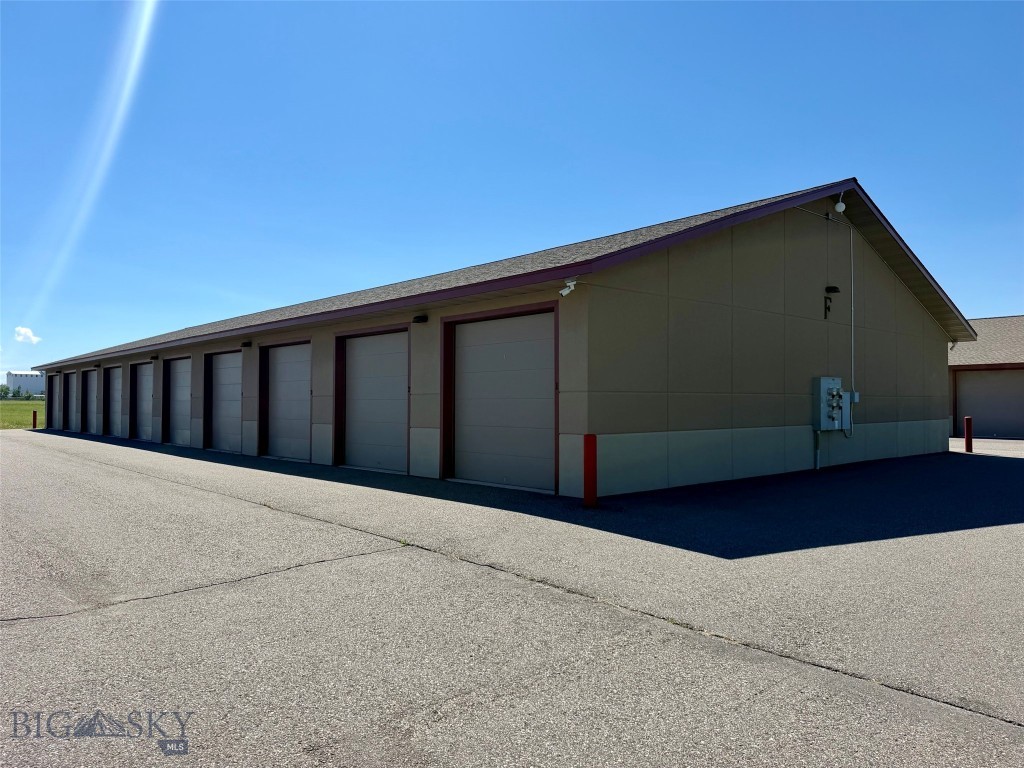 Rare offering of a heated, insulated airport garage. This unit is one of only a few heated units available in the Airport Garages. Conveniently located at the Bozeman International Airport, this is the chance to secure a covered, heated location for your car while traveling to and from Bozeman/Big Sky. The garage is 23 x 11' 10", offers keyless entry, and a 9 x 9 garage door. Managed by an HOA. Current ground lease with the Airport Authority expires in 2031, but there is a lease extension through 2036 currently in negotiation with the Airport Authority that should be settled in the next 1-2 months.