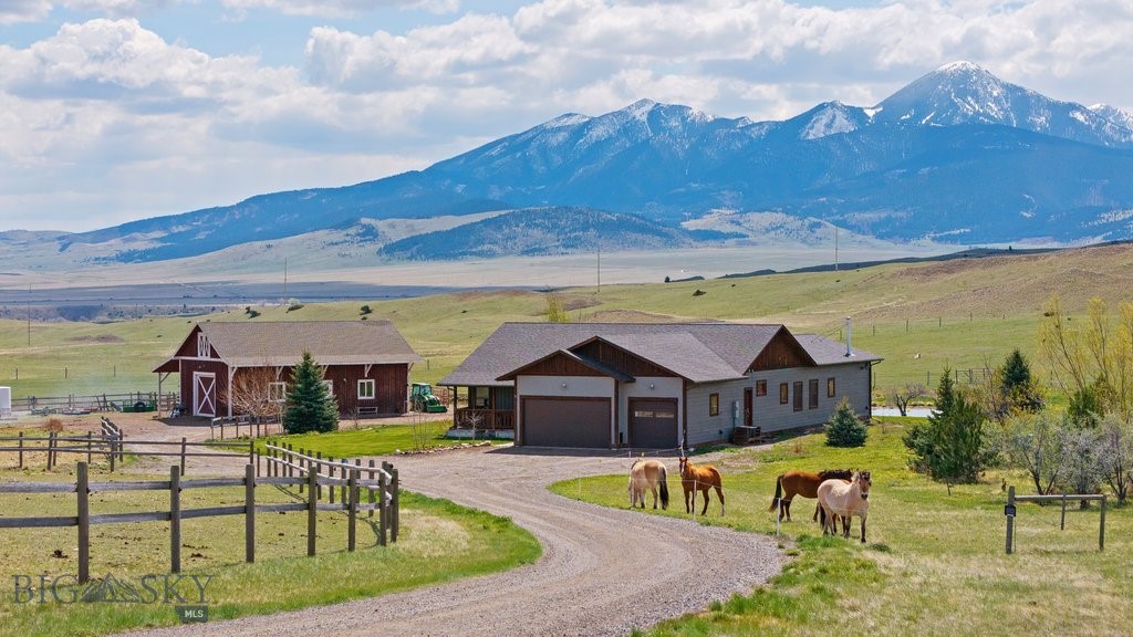 Experience the ultimate Montana lifestyle on this stunning 20-acre property, offering a perfect blend of privacy, luxury, and convenience only 5 to 10 minutes from downtown Livingston. This 4,620 sq ft home features expansive windows for panoramic views, a chef’s kitchen with two pantries, a serene landscaped yard, and a well designed shop/barn, all fenced for horses. The spacious 3-bedroom,  2 and a half bathrooms, an office  and more. Featuring large rooms, abundant natural light and a dedicated laundry room/mudroom with a dog wash station and  an oversized attached garage. 
A cook's dream kitchen with massive counter space. The primary suite boasts a full bath with a soaking tub, step-in shower, tile flooring, and tandem sinks.
The two bedrooms share a Jack and Jill bathroom each with their own walk-in closets. The basement is 1884 sq ft of well started additional space with high ceilings is drywalled and has the plumbing stubbed in for a bathroom and bar area.
Oversized attached garage includes a heated, finished extra room for hobbies, complete with metal shelving and cabinets superior lighting and exterior access.
The horse set up includes nice rail and wire fencing which is perimeter and crossed fenced as well as corrals and pens and automatic waterer.   A versatile  25 X 50 shop-barn combo is well designed with two interior stalls, workbenches, room for more vehicles, the hay loft holds up to five tons of hay.
Live off the beaten path while enjoying quick access to Livingston, just far enough out that it easy to go back in to town for that forgotten grocery item.  20 serene acres with established landscaping, lawn,  private back patio, and thriving wildlife like antelope, deer and fox. This is the turnkey, private Montana paradise you have been looking for.