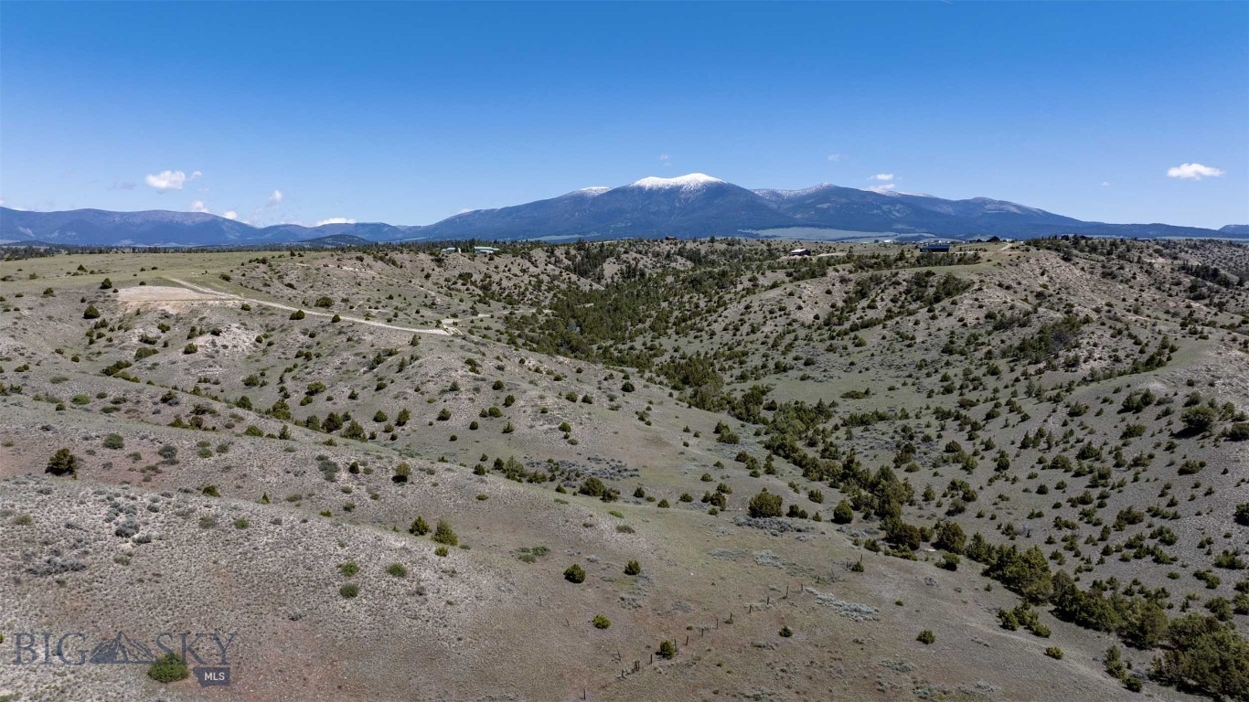 Build your dream home or a private retreat on this stunning 40-acre property in the foothills of the Big Belt Mountains. This land offers expansive valley views of Canyon Ferry Lake and the Elkhorn Mountains.

The property consists of two separately deeded 20-acre parcels and is ready for immediate construction. Existing infrastructure includes a constructed driveway, a 400-AMP electrical service, a drilled well, and a septic system designed for a four-bedroom home.

Whether you are looking for a full-time residence or a getaway cabin, this location offers ample space for horses and frequent visits from local wildlife. While providing a private setting, it remains conveniently located near essential amenities and recreational opportunities. Public lands are nearby, with state land just a couple of miles down the road and U.S. Forest Service access just up the county road. Additionally, the Helena Regional Airport and Bozeman Yellowstone International Airport are both within approximately an hour's drive.

Schedule your showing today!