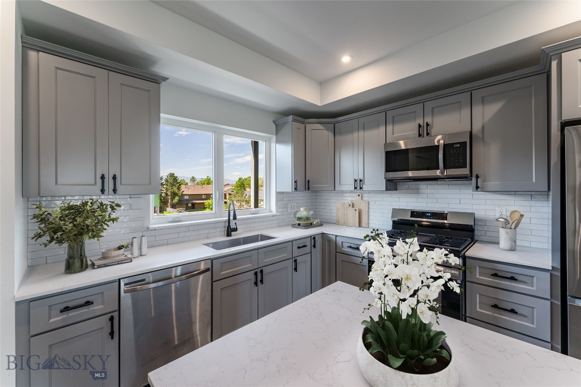 This 2 bed 2 bath condo sits right across the street from Montana State University and offers beautiful views of the Bridgers from your private patio. Located in a secure building, with a 1 car attached garage, this condo offers safety and comfort. In the heart of Bozeman, many amenities are close by including downtown Bozeman just minutes away.