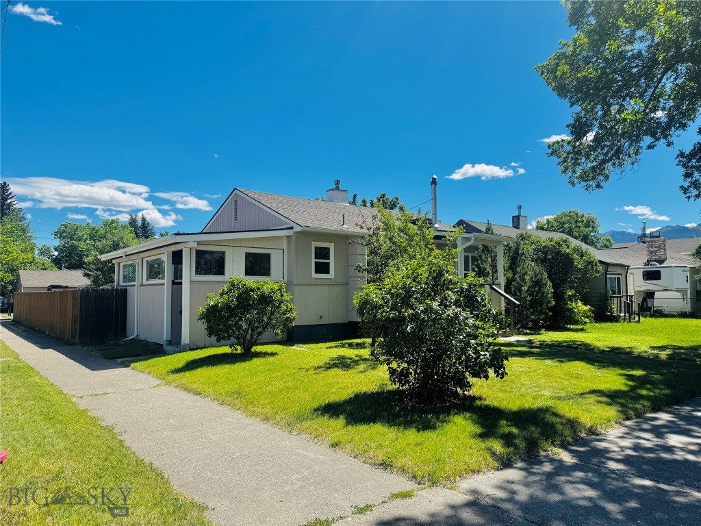 Welcome to this classic 1949 2-bedroom/1-bathroom home located on Livingston's coveted Southwest side. This move-in ready home sits on a 7,000 sq. ft. lot with a generous 1,948 sq. ft. of living space. The main level presents an updated kitchen, oak hardwood flooring, a cozy living room with wood burning stove, 2 bedrooms, family room and full bathroom. The basement offers one non-conforming bedroom, laundry area, and office area. The home has a newer roof, painted cedar siding, and numerous new windows. The yard is fully fenced mature trees, green house and wood storage sheds. The large 2 car garage (768 sq ft) holds endless possibilities and provides ample storage for vehicles and recreational toys and tinkering. A prime Livingston location offers close proximity to schools, city parks and the picturesque Yellowstone River. Schedule your showing today!