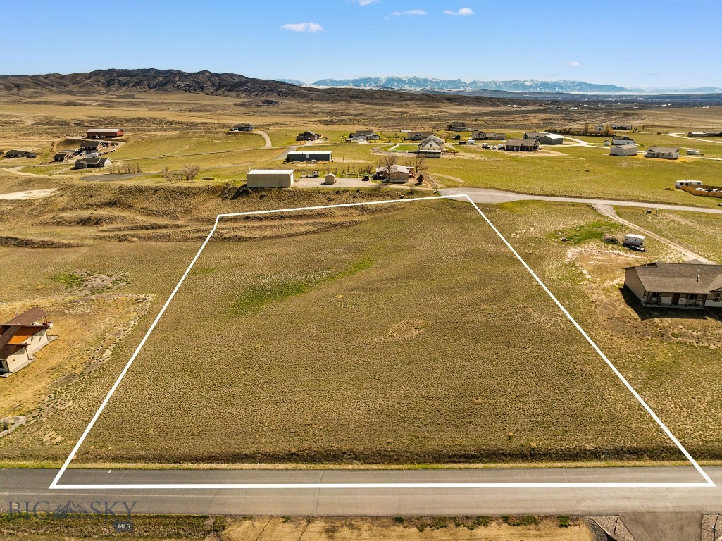 Set in the desirable Wheatland Meadows subdivision, this 2.17-acre parcel offers the perfect blend of space, convenience, and Montana beauty. With a gently sloping topography, the lot provides an ideal setting for building your custom single-family home—offering the potential for expansive views and a thoughtfully designed layout that takes full advantage of the landscape. Location is a standout feature, with quick and easy access to both Highway 287 and Interstate 90. Whether venturing to Ennis or Helena via Highway 287, or making a short drive to Bozeman on I-90, this property keeps you well-connected while still enjoying the peace and privacy of rural living. Bring your vision and build your Montana dream home on this ready-to-go homesite, where wide-open skies and convenience come together seamlessly.