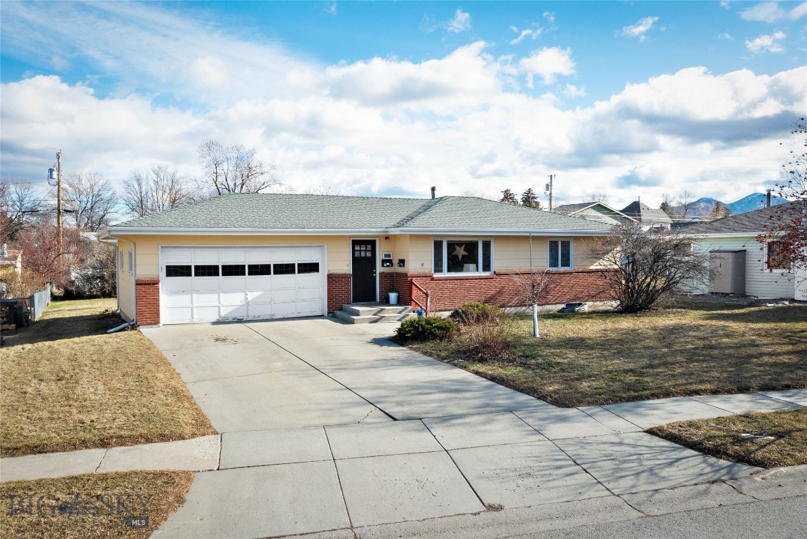 We are pleased to present this excellent investment property located just blocks from Main Street and Bozeman High School.

The upper unit features three bedrooms, 1.5 baths, hardwood floors, a large galley kitchen, dining area and a bright, spacious living room. The lower level includes three bedrooms, one full bath, a dedicated laundry room, and an open living, dining, and kitchen area and egress windows.

Both units share the garage for storage. Situated on nearly a quarter-acre lot, the property offers alley access and a spacious back patio for tenant use.