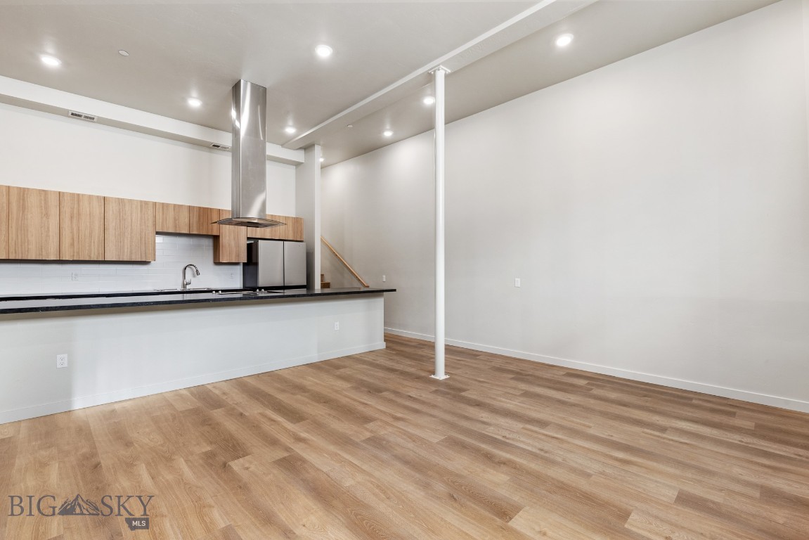 Experience modern living in historic Uptown Butte at Rudolph Condos, Butte's newest condominium development. This 1-bedroom, 1-bathroom condo features an open floor plan, lofted ceilings, and exposed brick. The stylish kitchen boasts stainless steel appliances, while the spacious living area is perfect for entertaining. Located in the heart of Uptown Butte, you’ll enjoy easy access to dining, shopping, and local attractions. Don’t miss this rare opportunity to own a contemporary condo in a vibrant, historic setting! 1 bedrooms are non-conforming