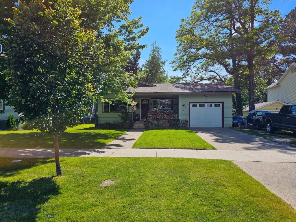 Welcome home to this charming 2-bedroom, 1¾-bath residence situated on a beautifully maintained lot on desirable McLeod Street in the heart of Big Timber. Just five blocks from downtown restaurants and shopping, and only two blocks from the city park, farmers market, and public swimming pool, this location offers the perfect blend of convenience and small-town charm.

The inviting covered front porch welcomes you into a comfortable living room, with a galley kitchen and adjacent dining area providing a functional and cozy layout. The recently remodeled full bathroom adds modern appeal, while both bedrooms are conveniently located down a short hallway. Washer and dryer hookups are available in the second bedroom, offering the option for convenient one-level living. The home has central air and on demand hot water, too.

The lower level features a ¾ bath, a cozy wood stove, and an open space ready for your imagination. Create the perfect family room, home office, workout area, guest bedroom, hobby space, or whatever best fits your lifestyle.

Outside, you'll appreciate the mature perennial flower beds, established shade trees, underground sprinklers, and a private backyard highlighted by a beautiful historic stone fence—a peaceful setting for relaxing or entertaining.

This tidy, well-cared-for home is full of character, flexibility, and potential in one of Big Timber's most desirable locations. Ready for its next owner to move in and make it their own!