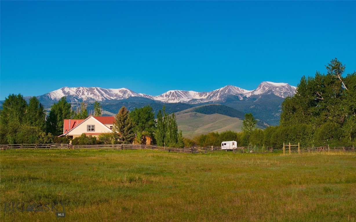 Nestled on the outskirts of the iconic Montana mountain town of Pony, lies the Diamond TR Ranch, home to Good Mama Farm. Sitting on just shy of 80 acres, this quintessential western property radiates that cool western Montana vibe everyone seeks. Improvements include a 1920 farmhouse, a livestock barn, a chicken coop, a pigeon coop, a greenhouse, a newer shop, equipment sheds, and a charming cabin that doubles as a writing studio. The property is a combination of riparian and range land bisected by North Willow Creek. It is fenced and cross-fenced into multiple livestock pastures. This property has no known covenants or zoning, offering tremendous opportunities. 48 miles from Bozeman, 30 miles to Ennis and the infamous Madison River, or as it's locally known, the 50-mile riffle. Other local favorite hotspots include Norris Hot Springs, Willow Creek Cafe, and Harrison Lake. 6 miles away is a trailhead into the Tobacco Root Mountains, where alpine recreation is endless. The view of Hollowtop Peak, the tallest in the Roots at 10,600 feet, from the ranch is magnificent.