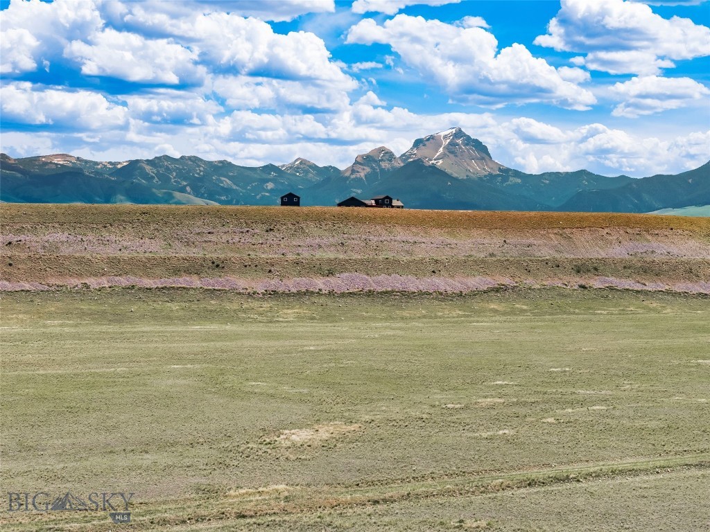 Discover 24.5 acres of pristine Montana land in the Sphinx Mountain Subdivision, where breathtaking views of the Madison Range and iconic Sphinx Mountain create an unforgettable backdrop for your future home or getaway retreat. This expansive parcel offers a rare combination of privacy, open space, and year-round natural beauty. Surrounded by some of Southwest Montana's finest outdoor recreation, this property is a gateway to adventure. Enjoy easy access to world-class fly fishing on the Madison River, endless public lands for hiking, horseback riding, hunting, ATV exploration, and snowmobiling, along with nearby opportunities for boating and camping. Yellowstone National Park is within reach for day trips, while the charming communities of Ennis and Virginia City provide local dining, shopping, and western heritage. Whether you're seeking a homesite with spectacular mountain views, a recreational basecamp, or an investment in Montana's wide-open spaces, this exceptional 24.5-acre parcel offers the freedom and scenery you've been looking for.