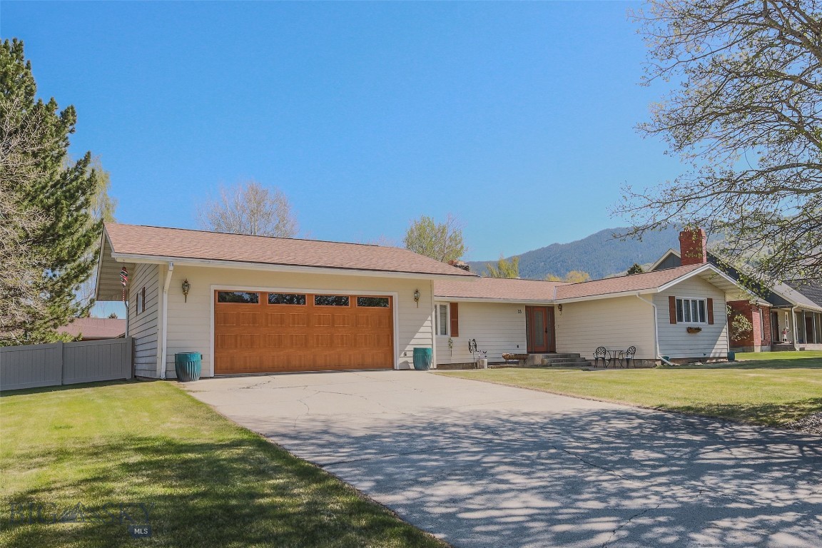 Immaculate & Updated Home in the Prestigious Country Club Neighborhood 

Discover the perfect blend of comfort, and modern convenience in this stunning 3-bedroom, 3-bathroom home, situated on a sprawling 14,810 sq. ft. lot in Butte's highly sought-after Country Club neighborhood. With 3,362 sq. ft. of thoughtfully designed living space, this property showcases true pride of ownership and is completely move-in ready. Step through the new front door into a bright, welcoming space featuring vaulted ceilings and gleaming hardwood floors. The main level flows effortlessly from a spacious living room, anchored by a magnificent floor-to-ceiling stone fireplace, to a formal dining area bathed in natural light from the new sliding door. The updated kitchen is a chef's delight, boasting beautiful new quartz countertops, stainless steel appliances, and ample cabinet space. Entertaining is a dream with the brand-new, 400 sq. ft. maintenance-free Trex deck, offering the perfect setting for summer barbecues and quiet evenings outdoors. The lower level is an entertainer's paradise, featuring a fully finished family room with a wet bar, a private wine cellar, and a versatile bonus room ideal for a home office, gym, or guest quarters. Recent upgrades provide peace of mind for years to come, including a newer furnace with a brand-new humidifier, central air, and fresh interior paint. This turn-key residence offers an unparalleled opportunity to enjoy a premier lifestyle in one of Butte's finest locations. Schedule your private showing today!