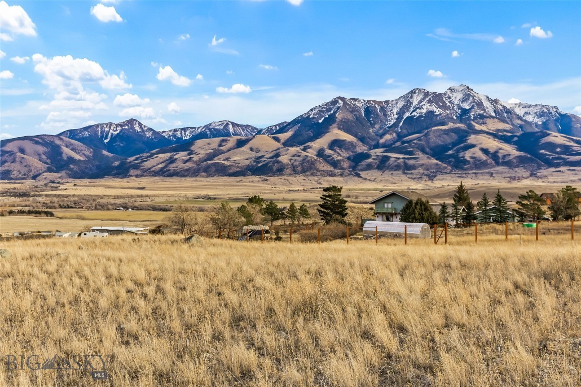 Experience the best of Paradise Valley from this exceptional South Glastonbury homesite, offering breathtaking panoramic views of the Absaroka–Beartooth Range and the iconic Emigrant Peak. This gently sloping 2.5 acre parcel is perfectly situated for your dream build, capturing stunning light and sweeping mountain vistas.

Enjoy convenient, year-round access via mostly paved roads, along with the benefit of a shared well already in place. The location is unbeatable—just minutes from the Yellowstone River for world-class fishing and recreation, as well as the renowned Chico Hot Springs and Sage Lodge for dining, soaking, and luxury amenities.

Whether you're envisioning a full-time residence or a peaceful Montana retreat, this property delivers an ideal blend of scenery, practicality, and proximity to Paradise Valley’s most sought-after destinations.