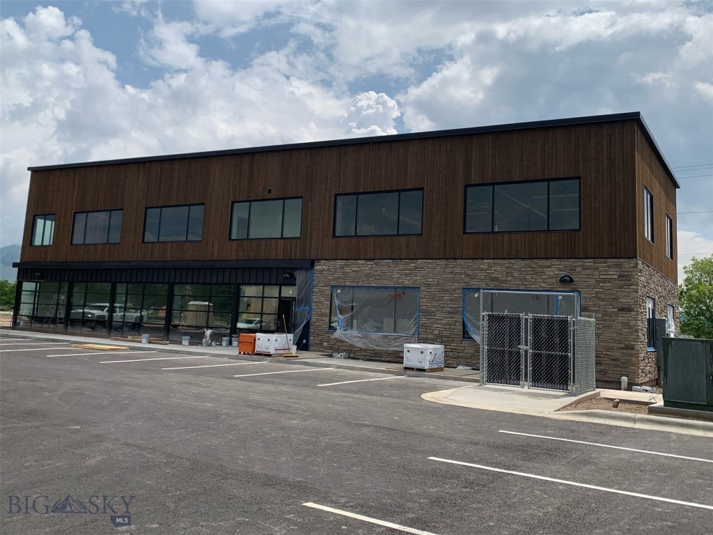 Mullan Crossing Office Condo, Unit #C.  Located on the 2nd floor of Building #2. Positioned north of Mullan Rd and west of Reserved St, just off Clark Fork Ln, Mullan Crossing offers unbeatable accessibility in a thriving commercial district. Completed in summer 2023, this new construction boasts modern amenities, energy efficiency, and a professional atmosphere. Builder will finish to your design. Key Features: -Private Entrance: Impress clients with an exclusive entrance. -Ample Parking: Hassle-free parking for you and your visitors. Lease rate is $27 psf NNN - $4,250 per month plus NNN. Triple nets are estimated to be $7.25 psf.

Highlights: - Total Space: 1,879 sqft - Impeccable New Construction by DAC - Large windows for natural lighting - Exclusive Private Entrance - Abundant Parking - Ready for Immediate Use Elevate your business in a premium location. Contact us now to tour Mullan Crossing and unlock your business's potential. Your ideal office condo awaits.