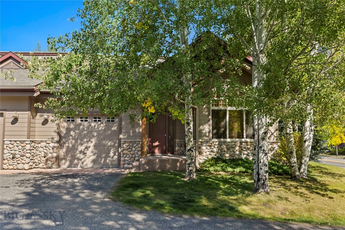 Located in the heart of Big Sky Town Center, this rare single-level Tamarack condo offers the ease of walkable mountain living just steps from shopping, dining, parks, trails, community events, and the complimentary Skyline shuttle with service to Big Sky Resort. Thoughtfully designed for comfort and convenience, the open-concept layout features vaulted ceilings and seamless flow between the living, dining, and kitchen areas.

Recent improvements include new hardwood flooring, fresh interior paint, updated lighting, a 2025 kitchen remodel, recently updated appliances, and a newer cold roof with the special assessment fully paid. The spacious primary suite features a walk-in shower and separate tub, while additional bunkroom and guest room provide flexibility for hosting family and guests. Sound mitigation upgrades and mature landscaping help create a comfortable setting while remaining close to all that Town Center has to offer.

Additional highlights include an attached heated garage, newer mechanical systems, and all furniture and accessories conveying for a fully furnished, turnkey opportunity. Ideal as a lock-and-leave mountain retreat, full-time residence, or investment property, this Tamarack condo combines single-level living, walkability, and convenient access to Big Sky’s year-round amenities and resort lifestyle.