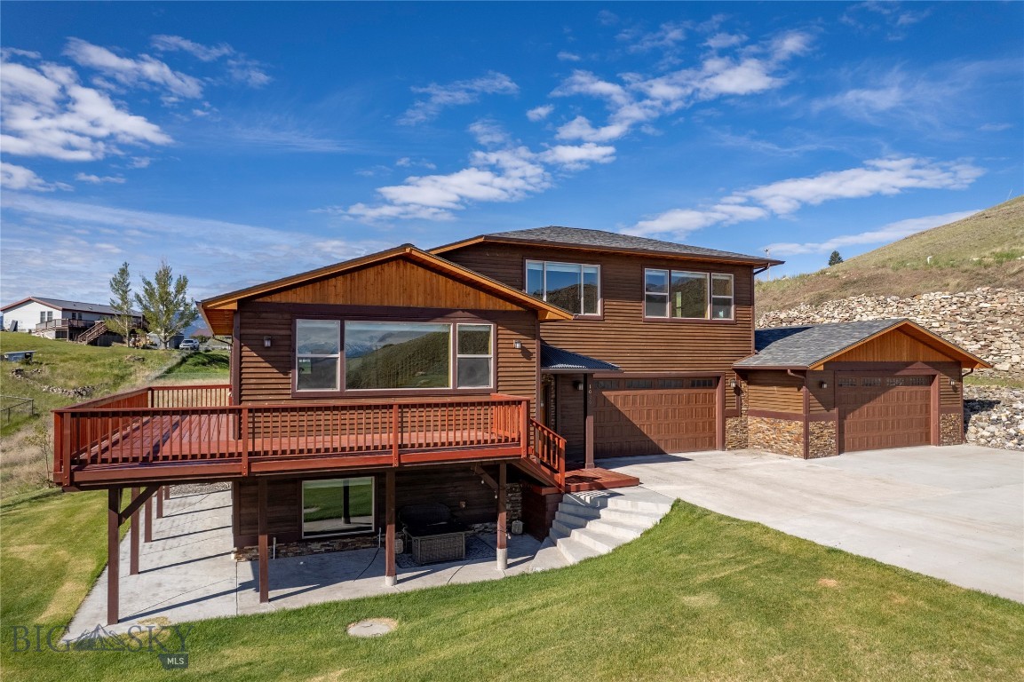 Tucked at the end of a quiet cul-de-sac, this beautifully positioned home offers privacy, expansive views, and the best of the Montana lifestyle. While the setting feels peaceful and secluded, the shops, restaurants, and charm of downtown Livingston are a short drive away.

This thoughtfully situated property captures sweeping views of the rolling Montana landscape stretching out beyond your front door. Wildlife is often seen passing through the area, creating a sense of connection to the surrounding natural beauty.

Set on approximately one acre, the property provides plenty of space to relax and play—whether watching the kids shoot hoops on the MegaSlam adjustable basketball hoop, walking the dogs, or sledding in the winter. Enjoy summer evenings on the deck and take in the dramatic sunsets and expansive views toward the stunning Crazy Mountains.

Designed to maximize natural light and capture the surrounding scenery, the home features an open-concept layout ideal for everyday living and entertaining. A triple-zone heating and cooling system allows for customized comfort throughout the home.

The property includes three spacious bedrooms with oversized windows, two and a half bathrooms, and a flexible ensuite space off the primary bedroom—perfect for a home office, reading nook, or private retreat. The kitchen features sandblasted granite countertops and a well-organized pantry with generous storage.

Two oversized garages provide ample space for vehicles, gear, or workshop use. Outside, an underground sprinkler system services much of the yard, helping maintain a lush lawn throughout the season.