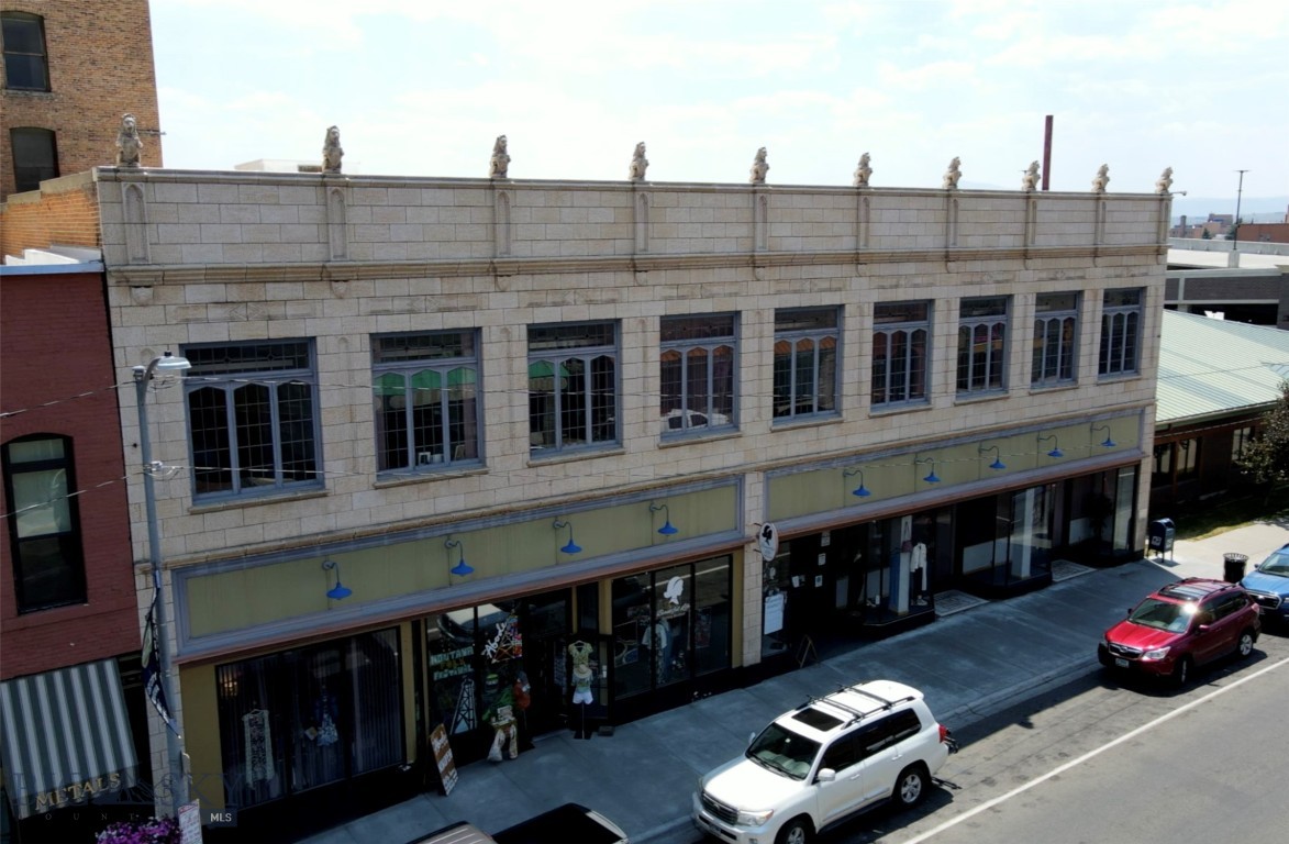 Impressive commercial building in the heart of Uptown Butte located near the corner of Park and Main Streets. The building comprises two above grade floors plus a basement, accessible via both an elevator and stairs. It consists of four distinct condominiums. Condo #1 (18,186sf) features a versatile layout that includes retail spaces, general offices, executive suites, reception areas, breakrooms and multiple bathrooms. Several units are currently rented, additional details can be provided with a signed Non-disclosure agreement. Condos #2 (4,645 sf) is unfinished space positioned at the back of the first level and is best described as warehouse/storage space. Condo #3 (8,086 sf) is located in the basement, and is also unfinished warehouse/storage space. Condo #4 (11,858sf) is situated in the basement and is currently being used as a parking garage.
Systems include heat, air conditioning, security, sprinkling and fiber optics. Uptown Butte has been experiencing a renewal for many years with significant re-development projects already complete and other major investment projects in-process and planned.