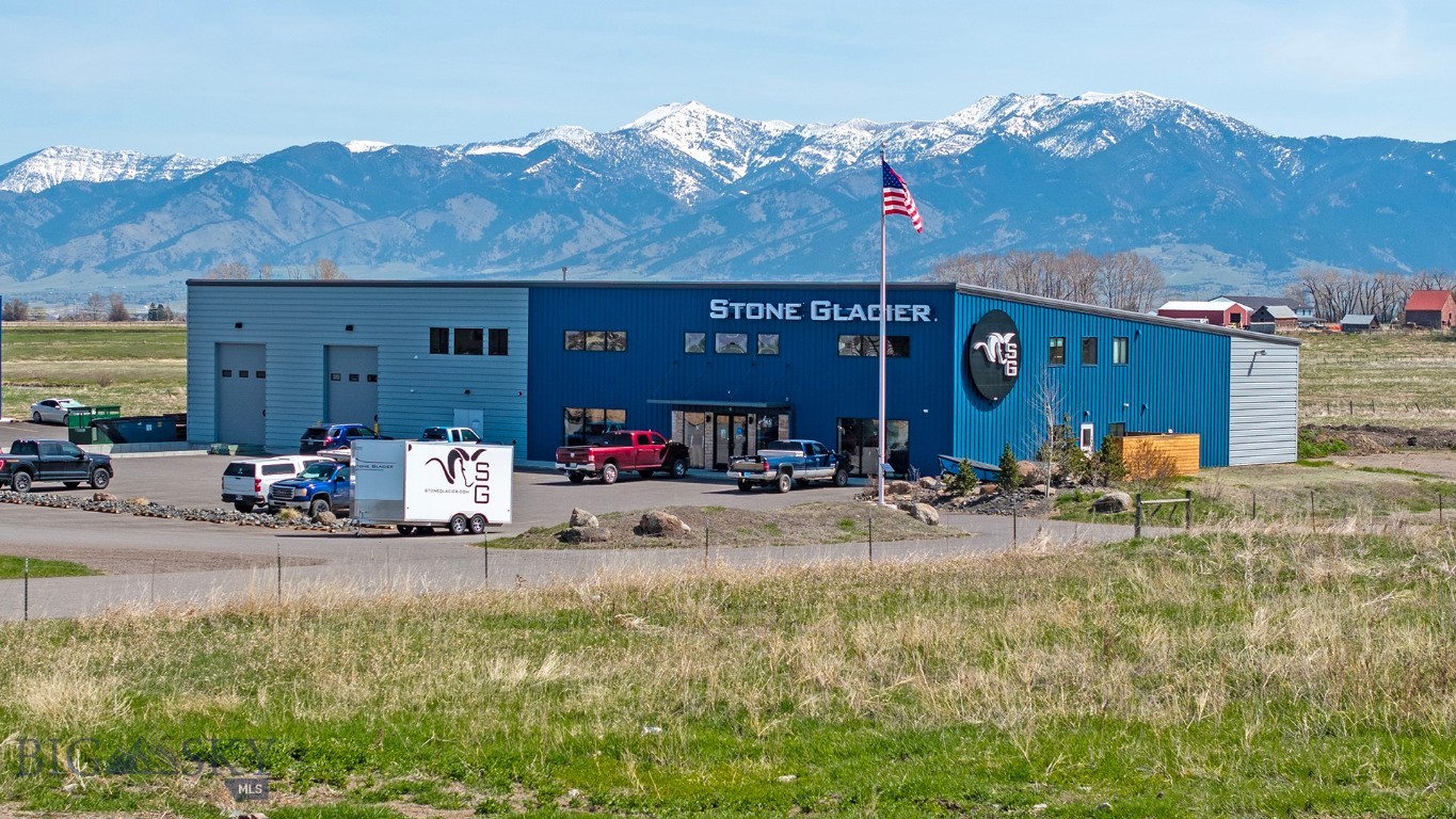 Prime warehouse and retail building for sublease: 13,500 SF, zoned mixed use in Bozeman's rapidly-growing west side.

Built in 2021, the building features a flagship retail space on 2 levels featuring air conditioning, open layout, high-quality finishes, ample windows and natural light.  One bathroom, staging room, storage room, backup heating. 

The warehouse space, also on two levels, features a large conference room, photo/video room, break room with full kitchen, tables, cabinets, and plenty of windows.  Outdoor fenced private break area adjacent to break room.  
2 bathrooms, conference room, open “customer service” call center / work area with 12 cubicles, and 3 hard-walled offices, small conference room.  Bay roll-up doors, 18’, (2), one with ramp, loading dock.  

The warehouse 2nd floor features two conference rooms, 3 hard-walled offices, 15 work spaces, and a 24’ x 36’ product development room.

Attached water storage and fire pump room.  Landlord pays for snow removal.  Wifi service and video surveillance across building campus.  Note the other building (167 All West Trail) is also listed for sublease: MLS 404616.  Lessee to verify all listing details.
