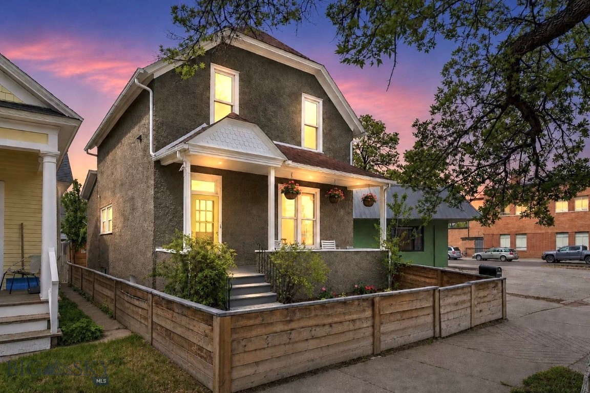 Located just across the street from Livingston’s historic downtown district, this 4 bedroom, 2 bathroom home blends authentic character with custom finishes in one of Livingston’s most coveted locations, with an ideal balance of neighborhood feel and accessibility. 
Thoughtful refurbishing and renovation completed during current ownership have enhanced the home while staying true to its roots.
Entering the home feels warm and inviting, with the main floor centered around a cozy wood stove and large picture windows filling the space with natural light. Woven wood shades complement the warmth and character of the living space. The main floor also features 1 bedroom and 1 bathroom. The kitchen was designed with both functionality and artistry in mind, featuring refurbished vertical grain fir flooring, rough sawn fir ceilings, hand-built fir cabinetry, honed granite countertops, custom walnut shelving, and a stunning custom walnut island perfect for casual meals and small family gatherings. New appliances, including an induction cooktop, bring a modern touch to the home’s timeless character. 
The refurbished staircase creates a beautiful focal point, taking you to the second level featuring 3 bedrooms all with high-end wool carpeting, 1 full bath and a laundry area. 
Outside, the property offers a combination of functional and creative space, including a heated detached hobby room/studio with an attached workshop area. Whether used for art, gear storage, woodworking, fly-tying, office, or additional flex space, the setup provides exceptional flexibility for a variety of uses. 
Light Mixed Use zoning expands the possibilities for how this property may be utilized in the future.
Don’t miss this one… This home captures the nostalgia of classic Livingston living — where front porch conversations, tree-lined neighborhoods, and a strong sense of place still matter.
