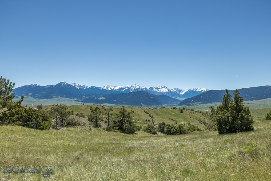 Spectacular 30.326-acre property with breathtaking mountain views and NO KNOW COVENANTS! Discover the beauty and serenity of this expansive property, offering some of the most stunning views you will ever see. With multiple build sites available, you will have the freedom to choose which of the three magnificent mountain ranges will be your primary viewshed. Whether you're looking to build your dream home or a vacation retreat, this land offers endless possibilities including Location, Location, Location! 5 Minutes to Livingston: Enjoy the vibrant town life with shops, dining, and community events just a short drive away. 40 Minutes to Bozeman: Experience the amenities of a larger city, including an international airport for easy travel. 1 Hour to Yellowstone National Park: Explore one of the most famous national parks in the world, right in your backyard. It is an Outdoor Enthusiast’s Paradise as this property is a gateway to a multitude of activities: Hiking & Biking: Explore scenic trails and enjoy the fresh mountain air. Fishing: Cast your line in nearby rivers and streams teeming with fish. Horseback Riding: Ride through picturesque landscapes and open spaces. Rock Climbing: Challenge yourself on natural rock formations. Skiing: Some of the best winter skiing is just a short trip away, making this a year-round destination.
This property is not just a piece of land; it's a lifestyle. Embrace the peace and tranquility of nature while still being close to the conveniences of town and the excitement of outdoor adventures. Don’t miss your chance to own a slice of Montana’s paradise.
Contact your favorite Agent today to schedule a viewing and start planning your dream home! Please park on the gravel road and walk onto the property as the grass is drying out fast!
