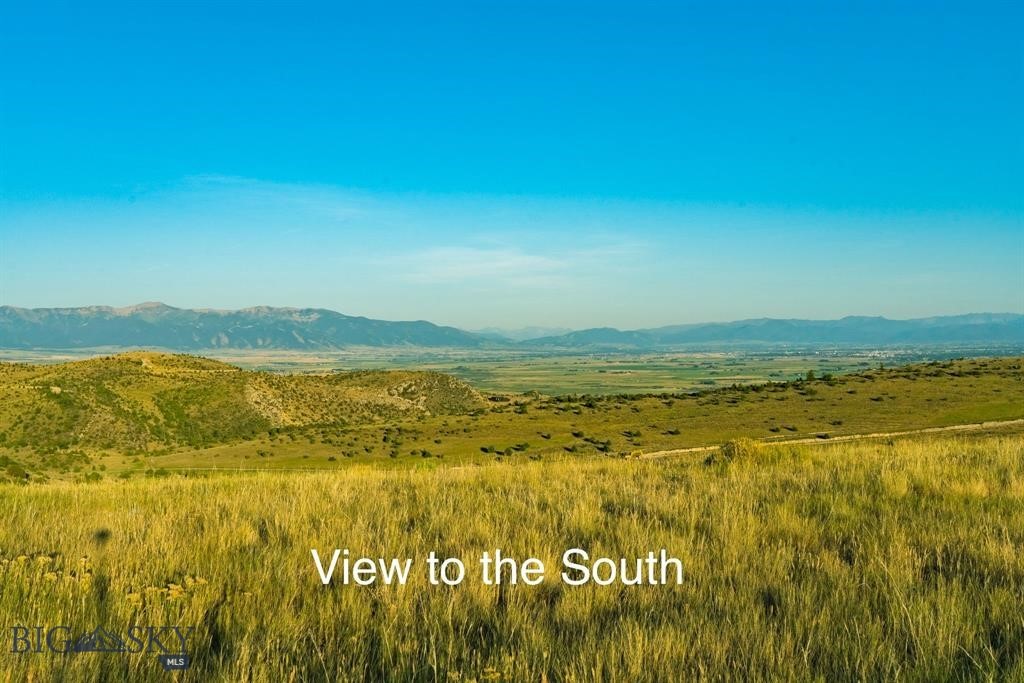 Enjoy panoramic mountain vistas from this exceptional 20+ acre parcel in the highly sought-after Gallatin River Ranch. Multiple build site possibilities offer sweeping views of the Bridger, Tobacco Root, Madison, Gallatin, Spanish Peaks, and Absaroka ranges. For the outdoor enthusiast, this community offers unmatched access to private Gallatin River frontage—perfect for fly fishing, floating, or simply relaxing by the water. You'll also enjoy access to 640 acres of state land and hundreds of acres of open space for hiking or horse riding. With power already to the lot and prior soil sample completed, you're one step closer to building your Montana dream home. All of this comes with peace, privacy, and protected views. This is wide open rural living-yet you're just a short drive from Bozeman’s shopping, dining, and the international airport. Ten minutes from desirable Manhattan Schools (K–12). (Some photos show GRR community amenities and may not be taken directly from the parcel.) Call your favorite Realtor® today for a full tour!
