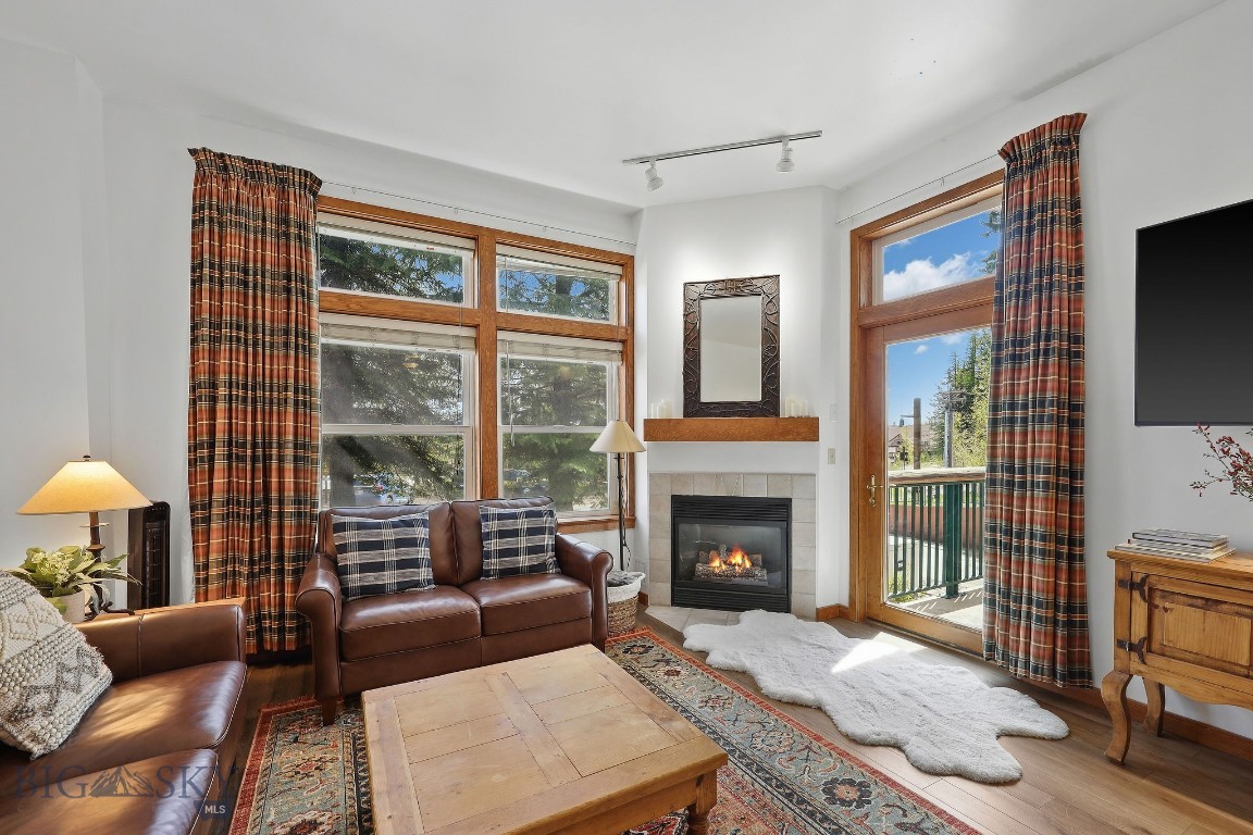 Kintla Lodge Unit 101 offers the ideal blend of mountain convenience, comfort, and year-round adventure in the heart of Whitefish Mountain Resort Village. Perfectly positioned just behind Chair 3, this immaculate ski-in/ski-out condo provides some of the best access on the mountain along with sweeping valley and mountain views.

This updated 2-bedroom, 2-bath residence has been tastefully refreshed with new flooring and paint and features a versatile lockout configuration, allowing the condo to function as either one spacious residence or two separate 1-bedroom, 1-bath suites — ideal for guests, rental flexibility, or personal use.

Unique to this unit, the living space is filled with natural light thanks to extra-tall ceilings and expansive windows that create an open, airy mountain retreat. The fully outfitted kitchen, cozy living spaces, and comfortable furnishings make it equally suited for relaxing après-ski evenings or extended summer stays. Offered fully furnished and turnkey.

As the only first-floor unit in Kintla Lodge, Unit 101 offers an uncommon level of privacy along with exceptionally convenient access to the owner’s lounge, outdoor hot tub, sauna, ski locker room, and heated underground parking.

Kintla Lodge amenities include heated underground parking, ski locker room, outdoor hot tub, sauna, and owner’s lounge. HOA dues conveniently include gas, water, internet, and cable.

Whether you are skiing fresh powder in the winter, biking and hiking in the summer, or enjoying Whitefish’s vibrant dining and recreation scene year-round, Unit 101 is an exceptional opportunity to own in one of Montana’s premier mountain destinations.