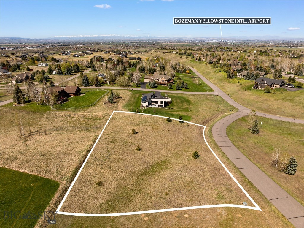 Bring your architect and create the Montana dream home you've always envisioned on this exceptional one-acre ± homesite in the highly sought-after Summer Ridge community. Perfectly positioned in the desirable Springhill area on the north side of Bozeman, this premier parcel offers an extraordinary opportunity to build a custom residence surrounded by some of the most breathtaking scenery in Southwest Montana.

Enjoy panoramic views in every direction, including sweeping mountain vistas, rolling foothills, and expansive Montana skies that provide a stunning backdrop for everyday living. Whether your vision includes a contemporary mountain retreat, a timeless ranch-inspired estate, or a luxury family residence, this property offers the space, setting, and flexibility to bring your dream to life.

Summer Ridge is known for its peaceful atmosphere, spacious homesites, and convenient location that balances privacy with accessibility. Outdoor enthusiasts will appreciate immediate access to world-class recreation, including hiking, mountain biking, skiing, fishing, and countless opportunities to explore the surrounding public lands and mountain ranges. Bridger Bowl Ski Area, Crosscut Mountain Sports Center, and the endless trails of the Gallatin Valley are all within easy reach.

For business professionals and frequent travelers, the location is equally appealing. Bozeman Yellowstone International Airport is just a short drive away, providing convenient access to major metropolitan destinations while allowing you to enjoy the tranquility and beauty of mountain living. Downtown Bozeman's vibrant dining, shopping, arts, and cultural scene is also easily accessible, offering the perfect combination of rural serenity and urban convenience.

Rarely does an opportunity arise to secure a home-site that offers this level of natural beauty, privacy, recreation, and accessibility. Build your legacy in one of Bozeman's most desirable locations and experience the very best of Montana living.