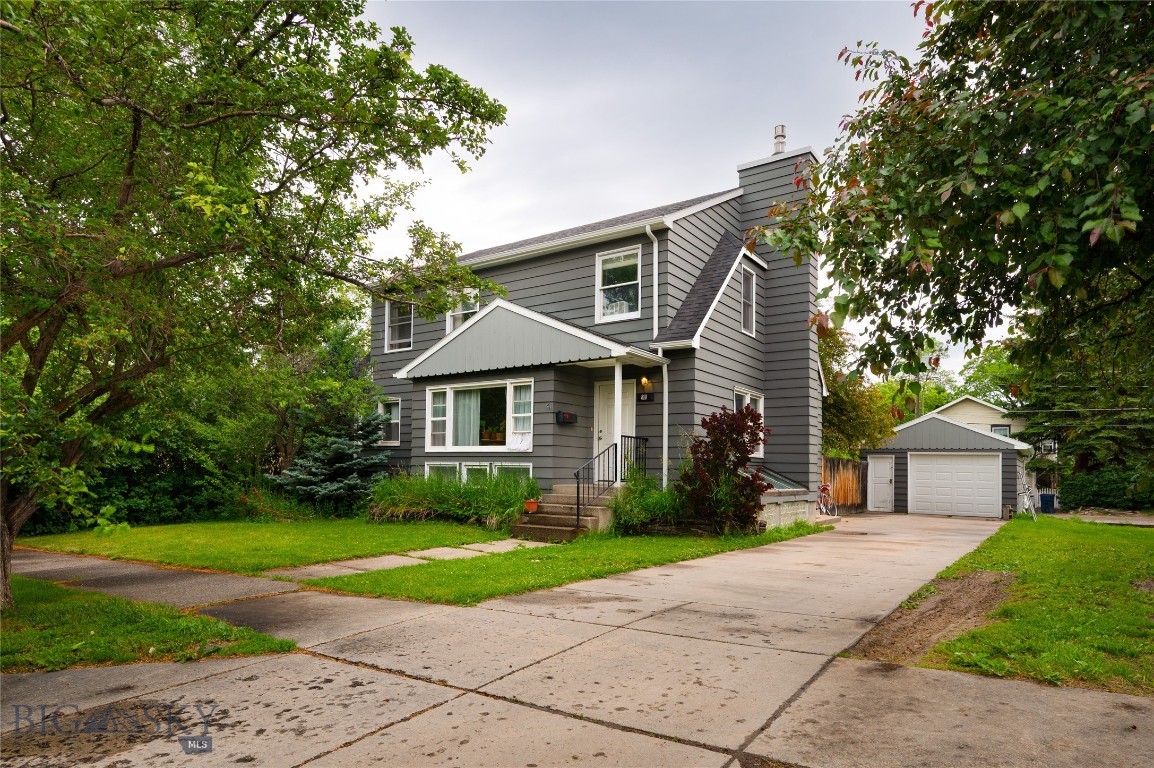 Wonderful opportunity 1/2 block from Montana State University. Built in 1952, this beautiful home has been lovingly cared for with many renovations over the years. The 3056 SF main house sits on an expansive 9603 SF, R2 lot. The main level is 2064 SF, and the second level is 992 SF. A spacious living room, dining area, kitchen, 1/2 bath, and a second living area make up the first floor. The second floor has 3 bedrooms, an office, and a beautiful, recently renovated bathroom. The 992 sf, 2-bedroom/1-bathroom daylight basement apartment is in excellent condition and does not have a basement feel. A rear deck, a fully fenced backyard, and a one-car garage complete the property. There is also quite a bit of off-street parking, which is a must-have given how close it is to campus.