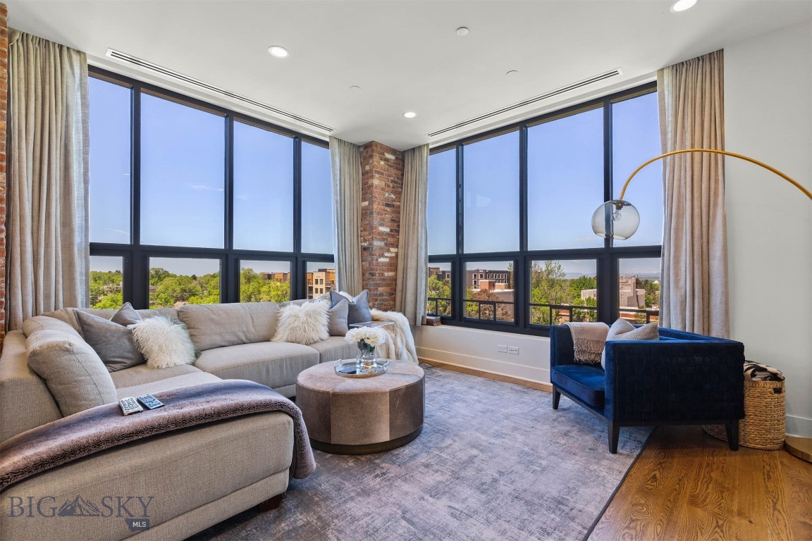 Come home to this desirable downtown 5 West penthouse level unit. With some of the best views in all of downtown Bozeman, this home offers 1 primary suite, an extra guest bathroom, and a light-filled  open living space with a chefs kitchen and custom brick accents throughout!  You don'y even have to leave the building to enjoy a couple great bar and dining experiences.  Just outside you are only steps away from Historic Downtown's many restaurants and retail shopping right in the heart of the city. The secure building provides a relaxing resident's lobby, roof top deck with breathtaking panoramic views, a fire pit, and outdoor furniture for entertaining with your closest friends and family, all under the famous "Big Sky" of Montana.