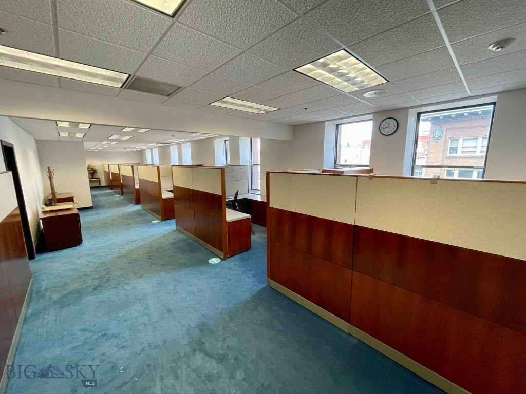 Located in one of Uptown Butte’s most historic and distinguished landmarks, the 3rd floor unit in the Hennessy Building offers just over 2,800 square feet of beautifully designed, move-in-ready office space.
Conveniently accessible by elevator, this suite is fully furnished for all your office needs — providing desks, chairs, and functional layouts that make it easy to start operating from day one. Expansive windows on multiple sides create a bright, open atmosphere and allow for flexible configuration options to suit a range of professional uses.
This space includes Cat 5 and Fiber Optic wiring for high-speed connectivity, secure building access and keyed entry covered parking, utilities and janitorial services included for added convenience and friendly management dedicated to helping businesses thrive.
Whether you’re establishing a professional office, creative studio, or boutique service space, this suite offers the perfect blend of historic character and modern efficiency. It’s an exceptional opportunity to join a vibrant and growing business community in the heart of Uptown Butte.

The Hennessy Building — where history and opportunity meet