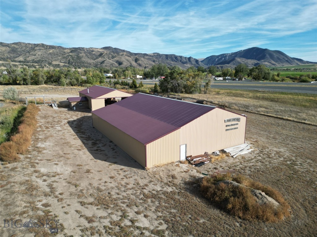 Turnkey Commercial Sawmill 

This is a rare opportunity to own a commercial property featuring I-90 frontage at a prime intersection between Bozeman, Butte, Helena, and Ennis. A fantastic investment for anyone looking to secure a centrally located, high-visibility space with easy interstate access.

The property spans 3.68 acres +/- and includes two large buildings with a total shop space of 7,200 sq. ft —perfect for a variety of business uses. The current operation as a sawmill proves the industrial capacity of the site. Whether you’re interested in manufacturing, semi-truck repairs, food production, or even starting a distillery, the potential here is boundless. Or start fresh with a new build for a hotel/motel or senior living facility!

Private road access and no zoning restrictions give you the freedom to develop this space to meet your exact needs, and seller financing or leasing is available 

Property Features:

Building 1: 40’x70’ with an office attached
Building 2: 55’x80’
3 Phases Electric 
Room to expand with additional buildings, including multi-story options
Equipment on property is negotiable:

Logosol PH360 4-Head Planer Molder
24” SuperMax Super Brush
Baker 26” × 12” Planer
Baker Blue Streak Band Saw (30HP Electric)
Baker Edger
Wall-Attached Work Bench
Wood Stove
4 × 8 Work Bench
AV-54 Auto Knife Grinder with Stand/Bench
(2) Wood Carts
(2) Roller Stands (8’ Long)
Banding Machine
All Dust Collection Extractors (except CNC machine unit)
All Wood Inventory Remaining at Time of Purchase
Resaw Table
Don’t miss this chance to invest in a property with high-traffic I-90 frontage with no zoning restrictions.
Schedule a tour today!

Maps & Videos
