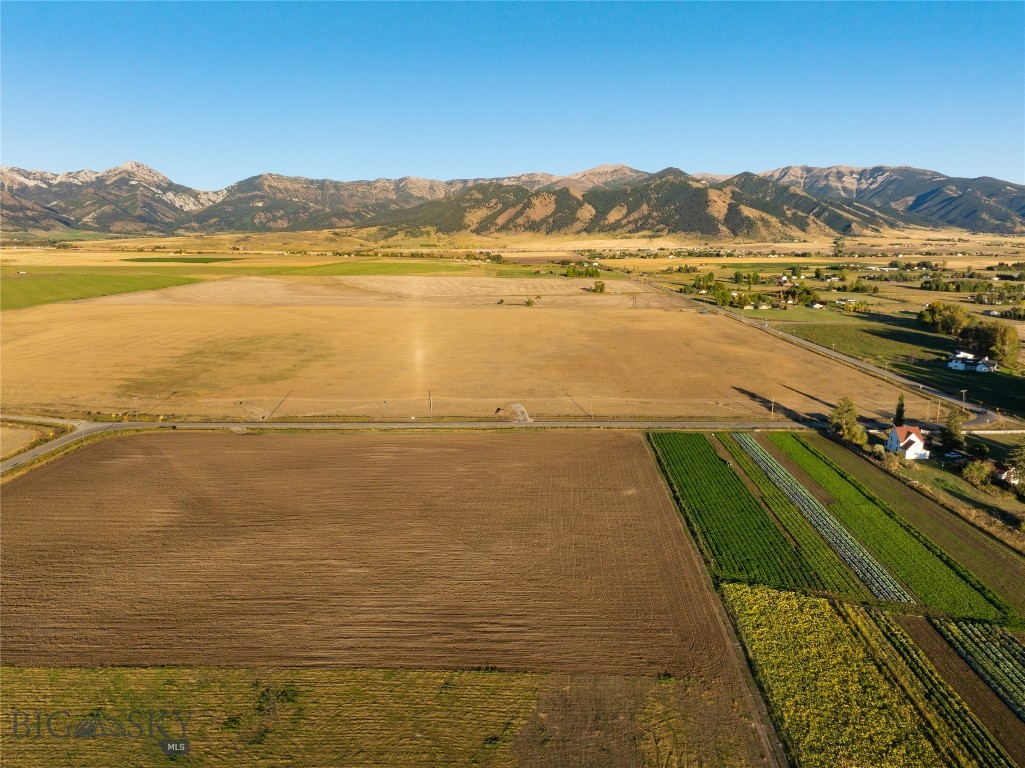 Experience the best of Montana living at Penwell Bridge Farm, a new offering where expansive views meet rural elegance. Perfectly positioned beside the renowned Amaltheia Organic Dairy, these 2.5 -3.5 acre parcels capture some of the most breathtaking scenery in the Gallatin Valley. The Bridger Mountains rise to the east while surrounding farmland and open skies frame the landscape to the west. It creates the perfect backdrop to build your dream home. Light covenants allow for multiple dwellings and rental opportunities of seven days or longer. Whether you’re seeking space or the freedom to build a truly custom retreat, Penwell Bridge Farm delivers. Just minutes from Bozeman, residents will enjoy easy access to dining, shopping, and recreation, while returning home each day to peace, views, and fresh country air. With Amaltheia’s CSA pick-up and seasonal U-Pick flowers right next door, local connection and natural beauty are quite literally part of the neighborhood. Don’t miss the opportunity to claim one of these one-of-a-kind homesites, where every sunrise over the Bridgers reminds you why you chose Montana.