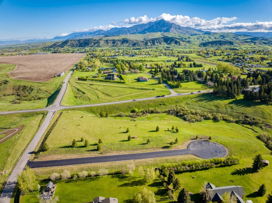 Discover a serene acre+ lot in South Bozeman that seamlessly combines urban accessibility with untouched natural allure, providing the perfect canvas for your dream home. Just a short 5-minute drive from Main Street and close to the hospital, vibrant MSU campus, and scenic trail systems, this property offers a unique blend of city convenience and unspoiled beauty for your custom residence. Enjoy panoramic vistas, direct trail access, and a connection to dedicated open space, offering both seclusion and a genuine neighborhood feel with spacious lots. Craft your dream home, melding urban rhythms with tranquil surroundings. Embrace the opportunity to own a piece of South Bozeman, where convenience harmonizes with pristine beauty and community. This lot is being offered with shovel ready plans. Grab your favorite builder and start construction on your dream home.