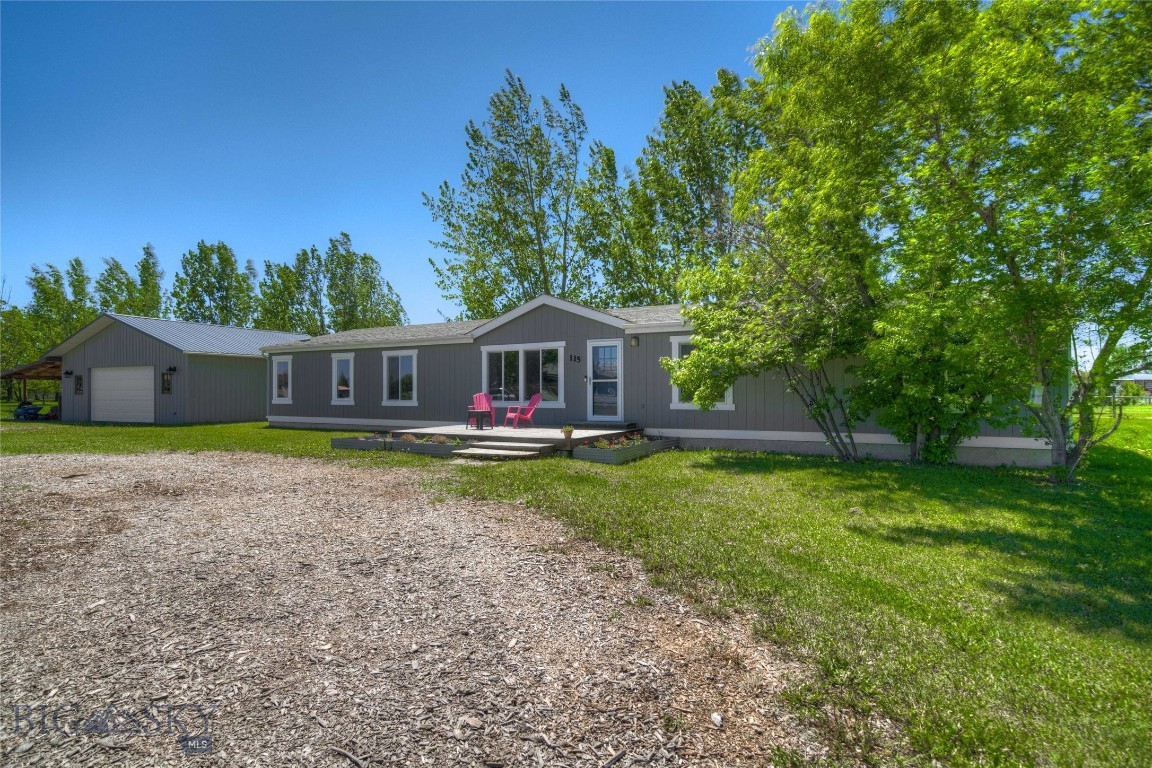 Are you looking for a bit of elbow room? Easy country style living can be yours! 115 Chisler Drive has the space and serenity that you have been seeking. This well-maintained property has plenty of room inside and out! Single level home has 4 bedrooms plus an office and two living spaces, it sits on just over an acre with a 30 x 30 foot detached garage/shop. The versatile shop space has 220V, 8-foot doors, dedicated circuits for power tools and a lean-to for additional storage. Relax and enjoy great Bridger views from the front deck or enjoy a little seclusion on the back deck. Kitchen highlights include a butcher block island and stainless-steel appliances. A ductless air conditioner and an efficient Sensi smart thermostat plus LED dimmable ceiling fans keep the home comfortable year-round. Great primary suite has walk in tile shower, dual vanities, big closet and spacious office area that can be closed off by double doors. A gas fireplace makes a cozy anchor to the second living area. Laundry area includes utility sink and backyard access. Back yard area is fenced for safe play space for pets and kids. Covenants allow for 1 horse with some conditions.