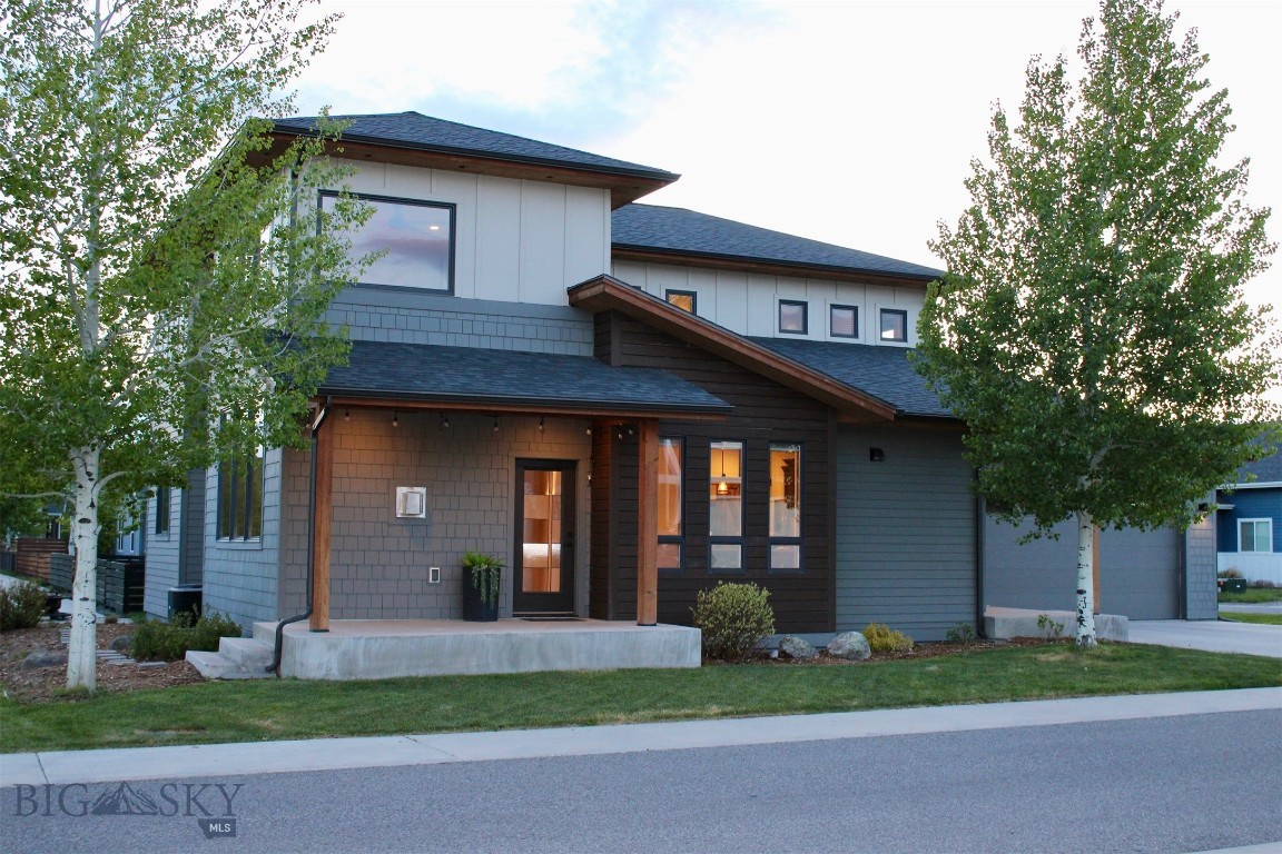 Set against breathtaking views of the lake and Mount Blackmore, this exceptional five-bedroom, three-bath residence offers an elevated Montana lifestyle in one of Bozeman’s most sought-after west side communities. Expansive windows frame the surrounding landscape, filling the home with natural light while capturing panoramic mountain and lake views from the main living areas. Thoughtfully designed for comfort and flexibility, the main level features a spacious primary suite along with an additional bedroom and full bath—ideal for guests, a home office, or convenient single-level living. Generous gathering spaces create an easy flow for entertaining while still offering warmth and everyday livability. Located in the charming Lakes at Valley West, known for its intimate streetscapes, walkable design, and low-maintenance homesites inspired by classic European neighborhoods, residents enjoy miles of trails, nearby parks, and year-round recreation. Spend summer days paddleboarding or swimming on the lake, then enjoy winter ice skating and fishing just steps from home. The lakes are stocked each spring, creating a unique local amenity right in the neighborhood. Perfectly positioned just minutes from downtown Bozeman and the Marketplace, this home offers the rare combination of scenic beauty, convenience, and lock-and-leave ease. Additional upgrades include a Kinetico water softener and whole-home dechlorination system.