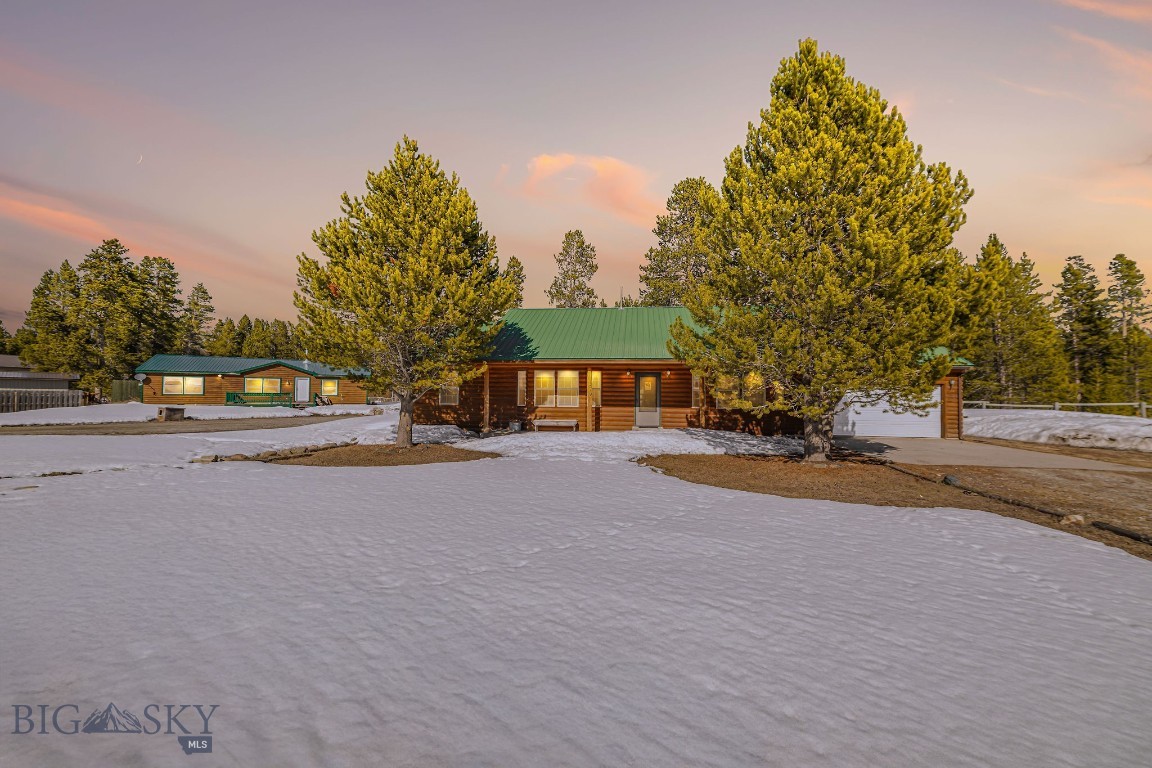 TWO STRUCTURES, ONE REMARKABLE OPPORTUNITY! Escape to nature with this stunning property just minutes from the west entrance of Yellowstone National Park. Whether you're seeking a year-round residence or a personal mountain retreat, this property delivers the perfect blend of rustic charm and modern comfort — all on a full acre of land. The main house offers 3 bedrooms and 2 full bathrooms, complemented by a private guest house with 3 bedrooms and 2 full bathrooms of its own. Both homes feature wood-burning fireplaces and cozy living spaces designed to soak in the breathtaking surrounding landscape. Step outside to unwind on the deck or back patio while taking in true Montana beauty. Perfect for outdoor enthusiasts with world-class hiking, wildlife viewing, hot springs, boating, and so much more right at your doorstep. Don't miss your chance to own a piece of paradise next to one of the most iconic national parks in the world. Schedule your tour today! Cannot be rented nightly. All information is deemed reliable; buyer to verify.