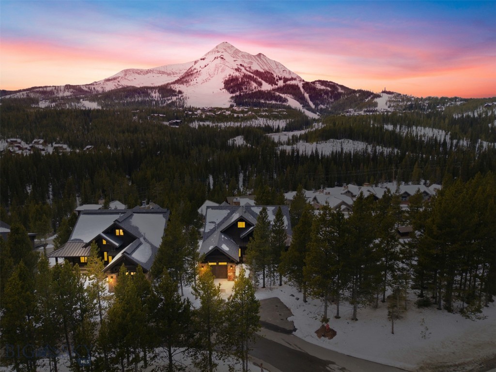 Set among Big Sky Resort with commanding views and ski access to the world class skiing at Big Sky Resort, 2 Highpoint Drive is a beautifully appointed four-bedroom mountain home that blends refined finishes with an exceptional alpine setting. Thoughtfully designed for both comfort and style, the residence offers expansive living spaces framed by dramatic mountain vistas—creating a sense of privacy and elevation rarely found this close to the heart of Big Sky. 

Thoughtfully positioned for ski access to Big Sky Resort, with world-class terrain only moments from home. Enhancing the home’s appeal is its proximity to the One&Only Moonlight Basin, along with the rare opportunity for ownership to pursue Moonlight Basin Club membership, offering potential access to private amenities and an elevated resort lifestyle. 

The interiors are inviting yet sophisticated, featuring rich wood accents, natural stone details, and expansive windows that showcase Lone Peak and the surrounding alpine terrain. Generous gathering spaces make the home equally suited for intimate mountain evenings or hosting friends and family, while the well-appointed kitchen anchors the main living area with premium appliances and timeless finishes. 

Ideally located just minutes from Big Sky Town Center, the home provides easy access to dining, boutiques, and year-round community events. Bozeman Yellowstone International Airport is approximately one hour away, while the iconic landscapes of Yellowstone National Park are within easy reach for day trips and even greater exploration. 

Offering a compelling balance of luxury, access, and long-term lifestyle value, 2 Highpoint Drive stands out as an exceptional mountain residence in one of Big Sky’s most sought-after settings
