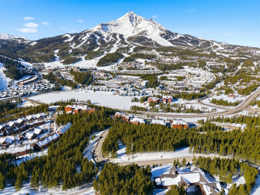 Five minute drive to Big Sky Resort ~ SUMMIT VIEW offers 12 months of recreational paradise. Summit View is a private ~exclusive, and gated low density community of beautiful homes. Views, Views, Views! In all its splendor ~ the pinnacle of Big Sky- LONE PEAK- will loom directly in front of you in its ever-changing, awe inspiring beauty, along with a panorama of the surrounding mountain peaks everywhere you look, thru every window of your home. This lot has an easy, flat drive -in entry, and a beautiful building site. Only a few minutes drive to Big Sky Resort for world class skiing, shopping, and dining. Summit View owners also hold interest in nearly 400 acres which have been permanently preserved as a nature conservancy within Summit View, with trails that connect to other Beahive Basin mountain trails for summer adventures.