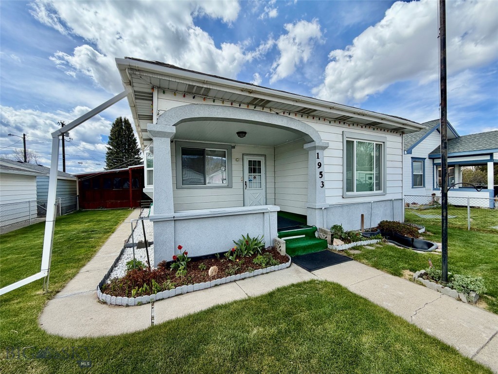 Charming and well-maintained, this 3-bedroom, 1-bathroom home offers comfort, functionality, and plenty of space both inside and out. The beautifully kept yard creates excellent curb appeal, while a versatile enclosed area—previously used as a hot tub room—offers endless possibilities as a sunroom, enclosed patio, or entertaining space perfect for barbecues and gatherings. The property also features a covered carport and two garages, providing ample storage and convenient off-street parking. Inside, you'll find a warm and inviting living area highlighted by two large bay windows that fill the home with natural light. The spacious basement adds even more flexibility with two bonus rooms, a large recreational/family room, a dedicated workshop area, and an oversized pantry for exceptional storage. Conveniently located on the flats, this home combines classic charm with outstanding potential, making it an ideal choice for anyone seeking extra space to grow.