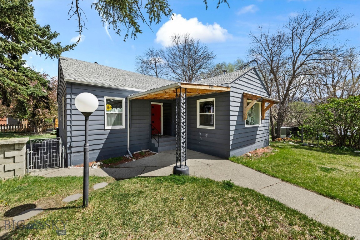Rare investment opportunity in one of Livingston’s most sought-after locations on South 9th Street. Situated on a spacious 0.321-acre lot—spanning four city lots—this unique property offers two homes and two 2-car garages, creating exceptional flexibility and strong income potential.

Just one block from Water Works Park and two blocks from the Yellowstone River, with easy access to scenic walking paths leading to Sacajawea Park and the beloved Livingston Farmers Market, the location alone makes this a standout for both long-term and short-term rental appeal.

The main residence blends historic character with thoughtful updates, featuring hardwood floors, 4 bedrooms, and 2 bathrooms. The open-concept living, dining, and kitchen area is filled with natural light from large windows that capture stunning views of the Absaroka-Beartooth Mountains. Recent improvements preserve the home’s vintage charm while adding modern comfort—marmoleum flooring, antique fixtures, a cozy wood stove, newer stainless steel appliances, and an updated kitchen that stays true to the home’s original style. The walkout basement expands the living space with 2 additional bedrooms, 1 bathroom, a laundry room, and a versatile flex space.  A covered outdoor deck extends the living space, offering a perfect setting for relaxing or entertaining while enjoying the peaceful surroundings. An additional loft area upstairs—accessed by pull-down stairs in the hallway—provides bonus space ideal for storage, a studio, or creative use.

Tucked behind, the charming cottage offers 1 bedroom and 1 bathroom with a full kitchen, featuring warm wood floors, marmoleum kitchen flooring, charming arched doorways, and a large picture window that fills the space with light—ideal for rental income, guest quarters, or multi-generational living.

The oversized yard, framed by mature trees along quiet Cambridge Street, provides exceptional privacy—an uncommon find for an in-town property of this size.

Currently occupied by terrific long-term renters, this property presents an immediate income-producing opportunity with upside potential in a premier Livingston location.
