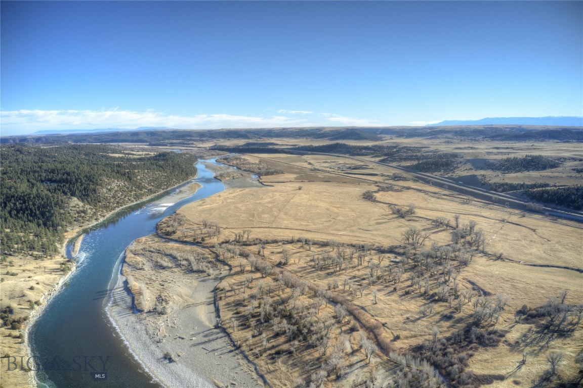 Check out this hard to find acreage with 3200 feet+/- of Yellowstone River frontage. The parcel is 152.34 acres with an old homestead that has power to it. This would make a great recreational property, build your dream home or use it as productive pasture land. This area if a frequent home to a large amount of elk, deer and birds so would make great hunting grounds and this stretch of the Yellowstone River has great fishing on it. It is currently being used as productive pasture with great grass yield for animals. Contact your favorite Realtor to tour this amazing property.