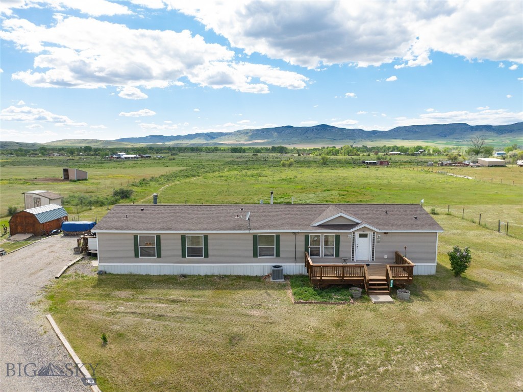 Here's a rare opportunity to own 10 acres with no HOA dues and a large finished home! This 4-bedroom, 3-bathroom home offers plenty of space and numerous recent upgrades. It features two living rooms, a dining room, and a laundry/mudroom. A new water heater and water softener were installed in April 2025. The roof was replaced in 2020. The home also includes a newer wood-burning stove, a new heater, and central A/C. All appliances have been upgraded within the past four years, and the vinyl plank flooring has also been updated. The owner installed a backup power system that can be connected to a generator. On the back half of the property, you'll find your own private park with meandering trails, a fire pit, horseshoe pits, a seasonal pond, numerous wildflowers, and a small shooting range. Wildlife frequently pass through the area, and the property boasts beautiful views. You’ll even discover some old relics from generations past. The property is lush with natural grasses and has never been overgrazed. Included with the property is a storage shed, large supply of firewood, along with a wood splitter, riding lawn mower, and a snowblower—everything you need to care for the land. Seller is in the process of moving out, so Interior photos will be up soon!